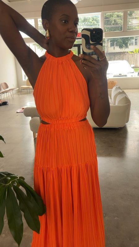 Affordable spring dress! Orange cut out dress with crinkle fabric and pockets, white floral slides and gold drop earrings  I’m wearing an XS. 

#LTKstyletip #LTKfindsunder100 #LTKfindsunder50