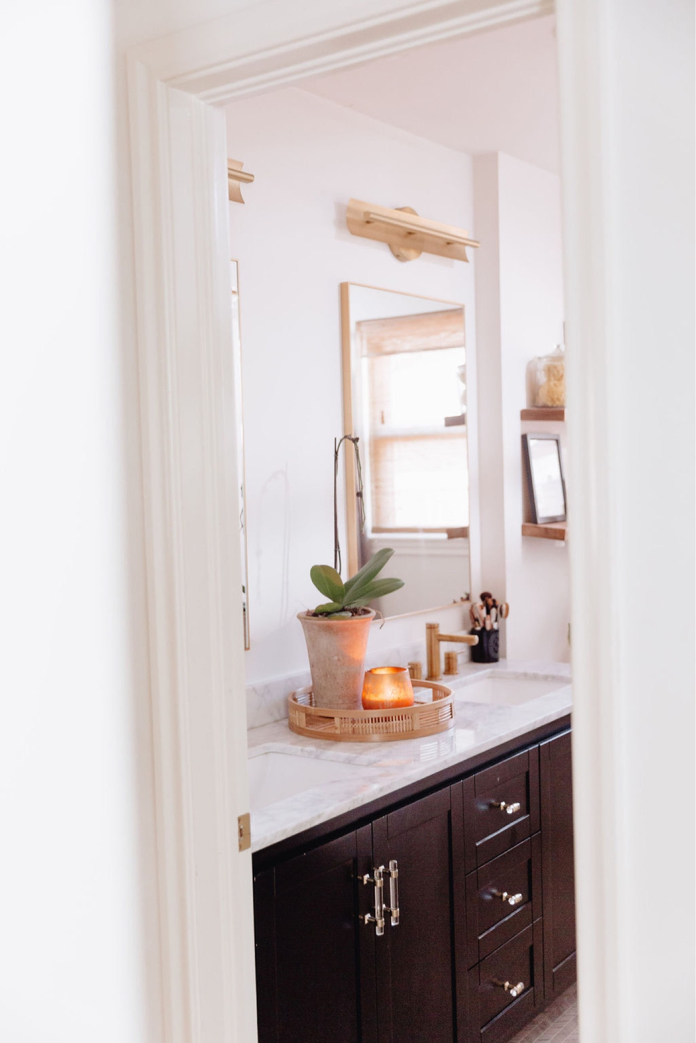 Bathroom // bathroom decor, bath, powder room, home decor, modern home decor, mirror, floating shelves, shelving, vanity, wall art, modern art, decorating, towels, rugs, neutrals, neutral home, decor, modern, minimalist, minimalist style, wall hanging decor, boho decor, neutrals, interior, interior design 