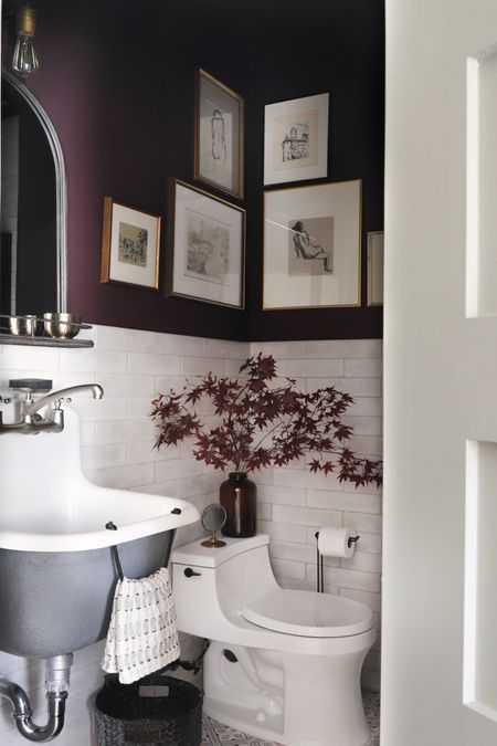The bathroom is eggplant and I love it! The light tile helps this little bathroom not feel so dark. The colors is just so rich  

#LTKhome