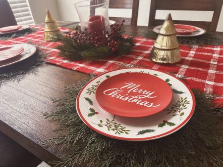 Christmas dining table setup, Christmas dinner table decor, how I set my dining room table for the holiday season, merry Christmas plates, cedar placemats, holly plates. 

#LTKHoliday #LTKSeasonal #LTKhome