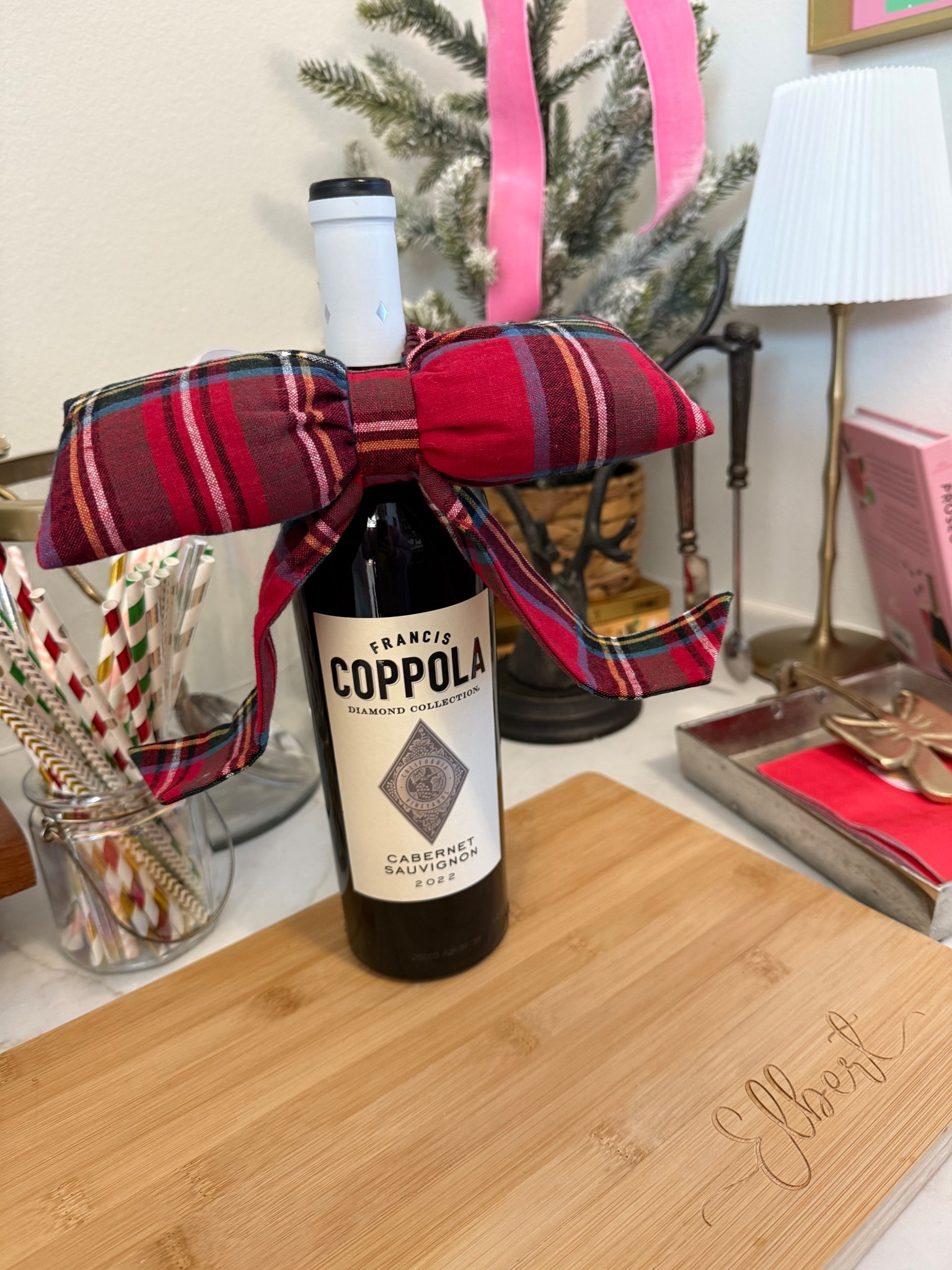 Holiday House warming gift idea! Pottery Barn Stewart plaid wine bottle topper! 

#LTKGiftGuide #LTKHoliday