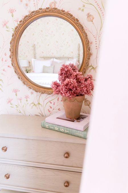 For many of us, having a dedicated guest bedroom is a luxury, but can also be a challenge to make it feel inviting as well as be functional. To help create a warm and welcoming space for our guests, we decided to transform this basic guest bedroom into a beautiful, colorful and inviting sanctuary. This charming pink and green guest bedroom offers the perfect little cozy retreat for visitors. The walls have been wallpapered in a soft pink and light floral print that we have carried throughout the room. 

#LTKunder50 #LTKhome #LTKsalealert