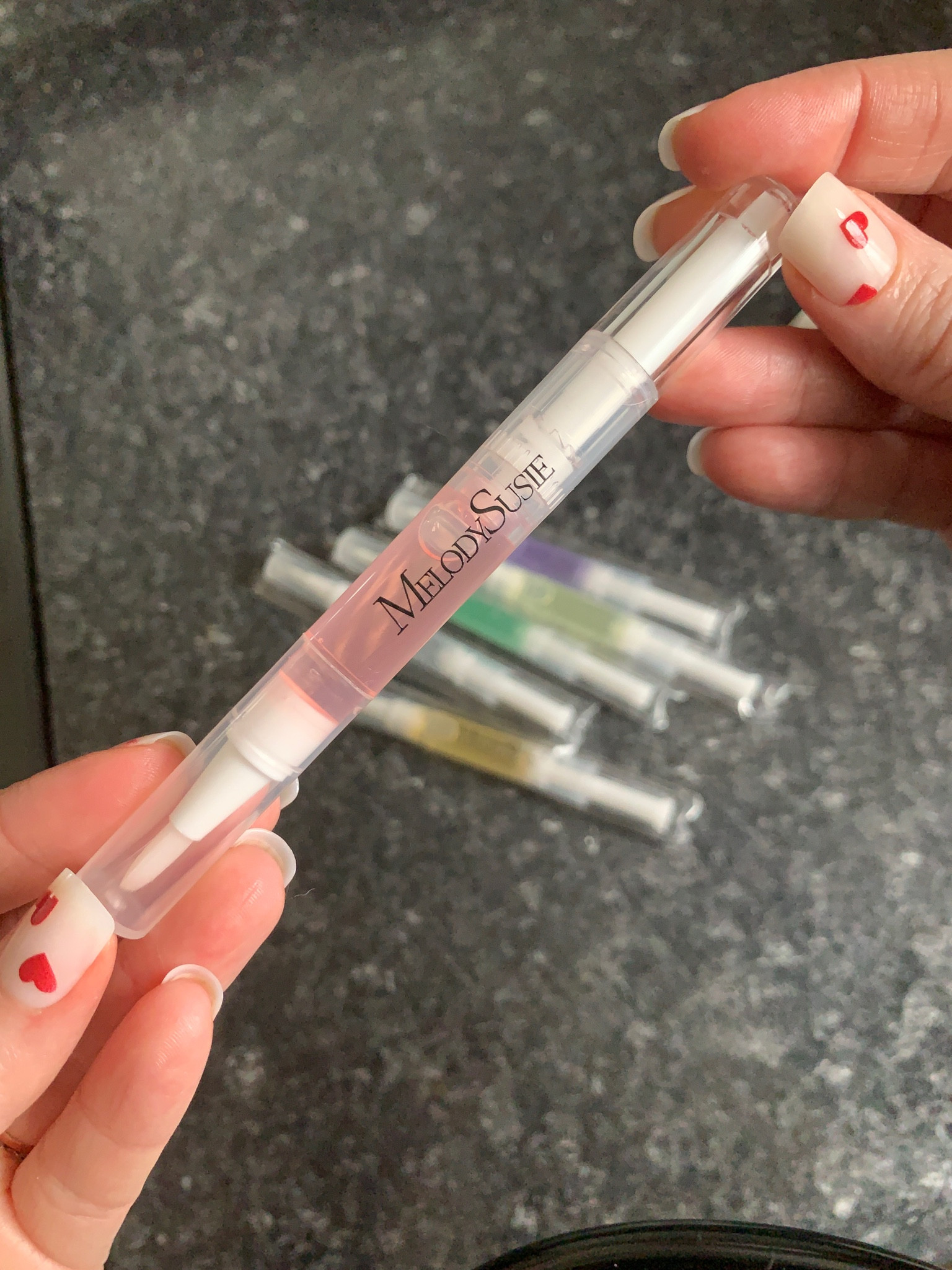 These nails are so fun for Valentine’s Day and the cuticle oil is one of my favorites. You get several different scents that each leave your cuticles feeling nourished and hydrated. My favorite part is that they are just so handy to have on hand. I have one in every place that I regularly use. My purse, night stand, coffee table drawer, bathroom drawer, and vanity. The twist style with the brush makes it easy and efficient to apply the oil where you want it without it getting everywhere. Great handy set!

I’ve also included some other options in case those don’t quite fit your fancy 

#LTKGiftGuide #LTKMostLoved #LTKBeauty