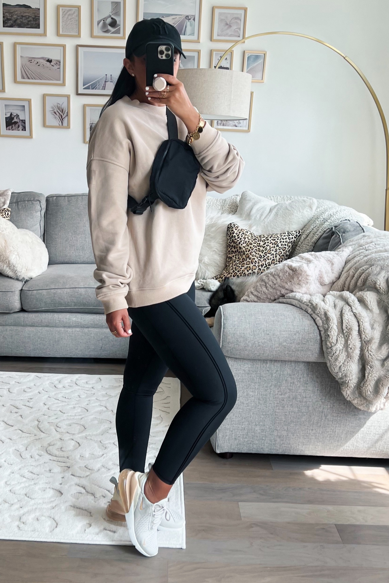 Alo yoga black leggings wearing size medium. Sweatshirt wearing size small. Nike air max 270 sneakers run true to size. Amazon belt bag under $20