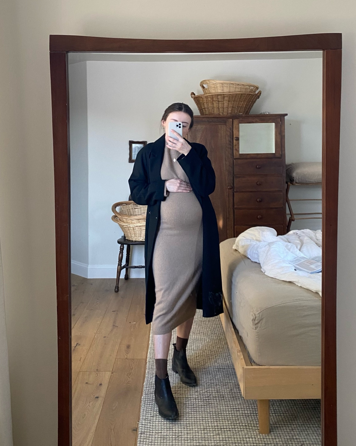 Dress is not maternity but very stretchy and comfy! Wearing my usual size!