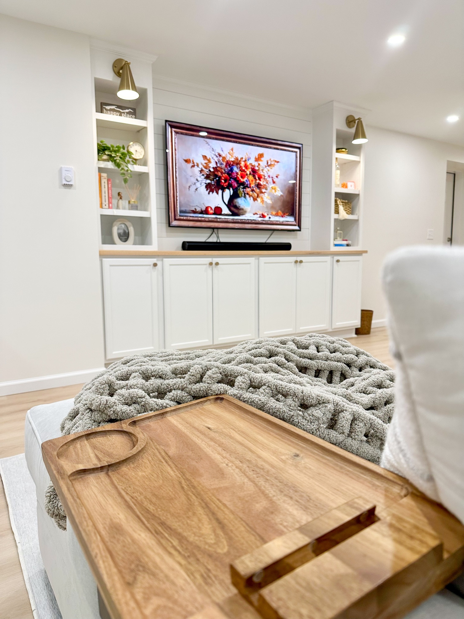 Sofa tray, couch tray, finished basement, built in bookshelves 

#LTKFamily #LTKFindsUnder50 #LTKHome