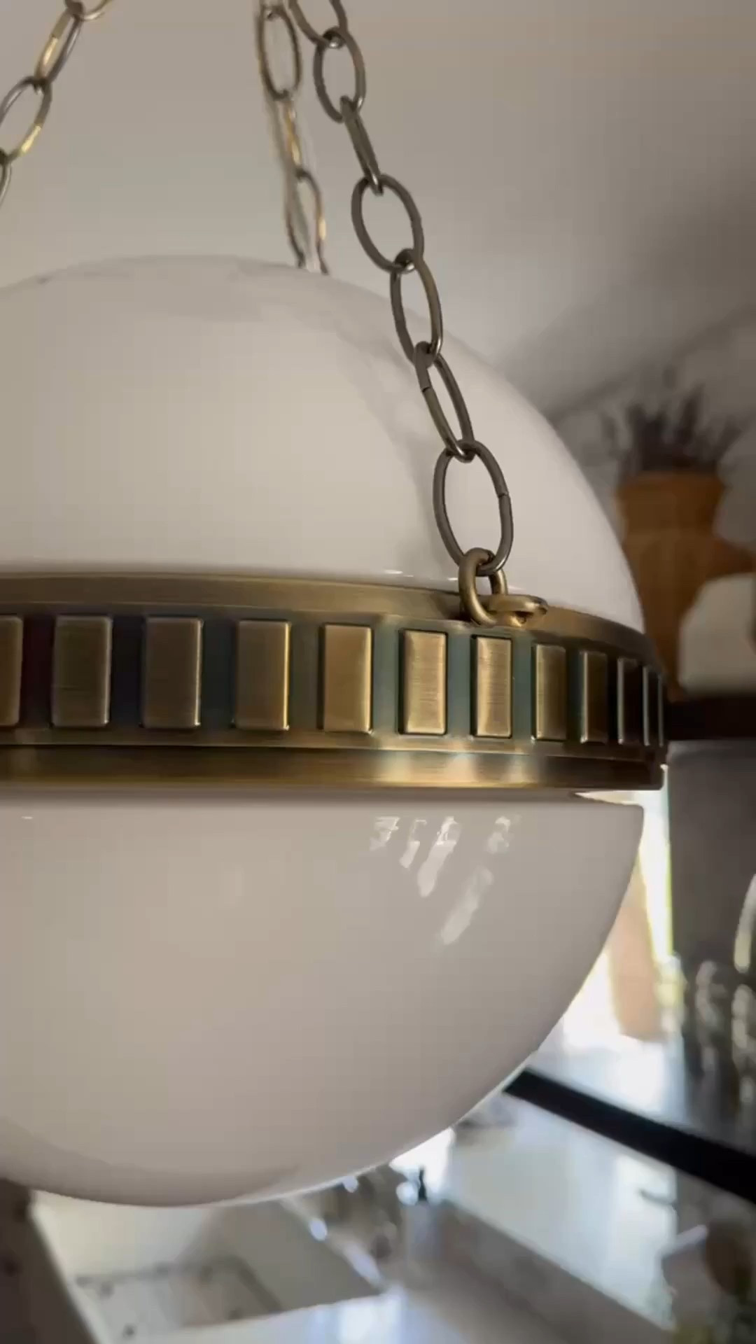 Kitchen glow ✨ A brass + glass globe pendant makes a bold statement above the farmhouse sink with chrome faucet. Marble countertops, a wooden cutting board, and open shelves with stacked plates + glass cloche styling create the perfect balance of function + charm. Accents like the wicker vase, blue + white planter, and potted herbs complete the space. 🌿
#KitchenLighting #PendantLightStyle #FarmhouseSink #MarbleCountertops #OpenShelving #GlassClocheDecor #WickerVase #BlueAndWhitePlanter #HerbDecor #eanesinteriors



#LTKdayinmylife #LTKHome #LTKvlog