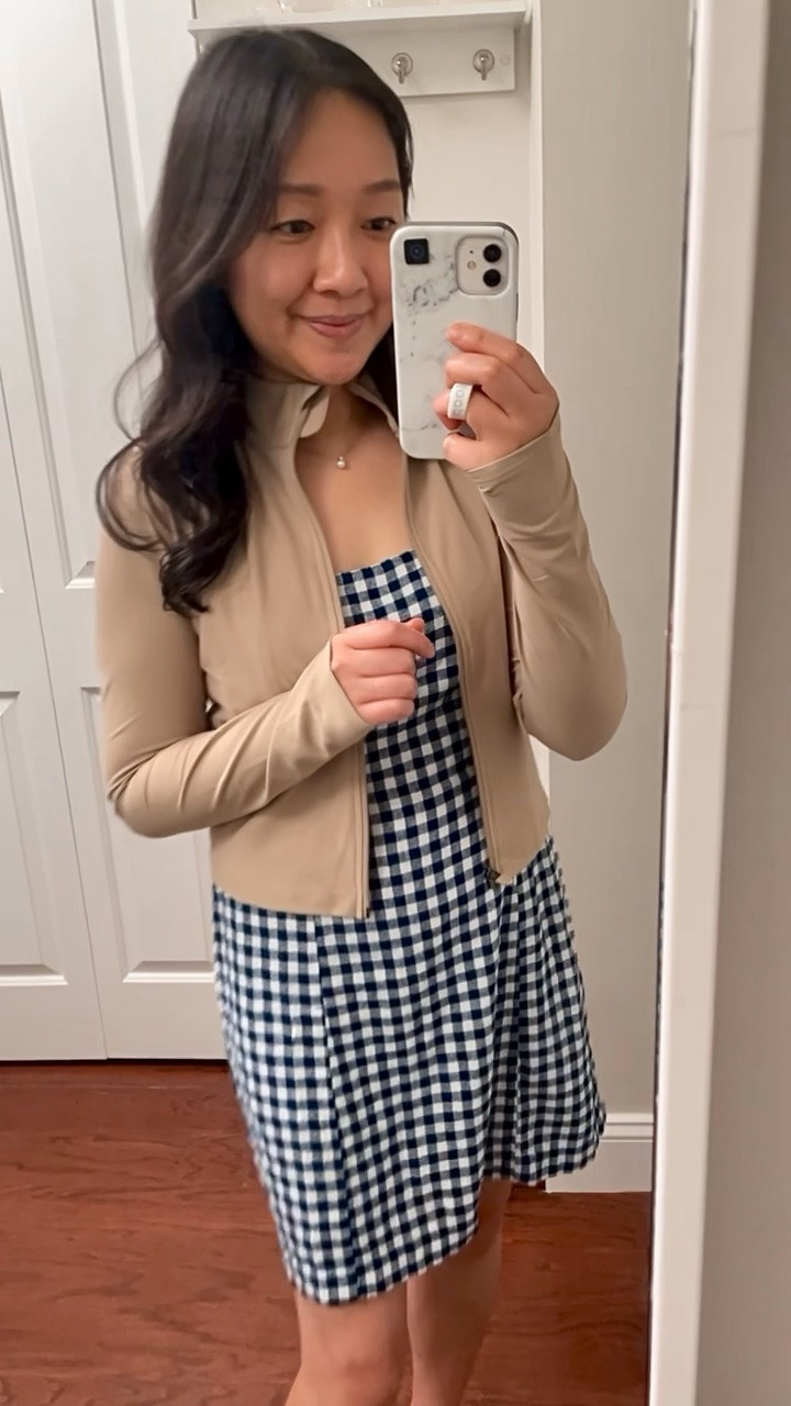 This Old Navy cropped athleisure jacket is so cute (available in 3 colors). I tried size S regular but I would prefer size M since I prefer a body skimming fit. The jacket is meant to have a snug fit though. Update: I received size M and it fit me well. However, I wish the collar would lay flat if I wanted but it stands up and bumps into my chin (a sensation that can annoy me when I'm sitting). I also wish there was a way to make the thumbhole more discreet.

Gingham dress is small petite but it does stretch out throughout the day due to the linen blend material.

I'm 5' 2.5" and 115 pounds.

#LTKFitness #LTKFindsUnder50 #LTKActive