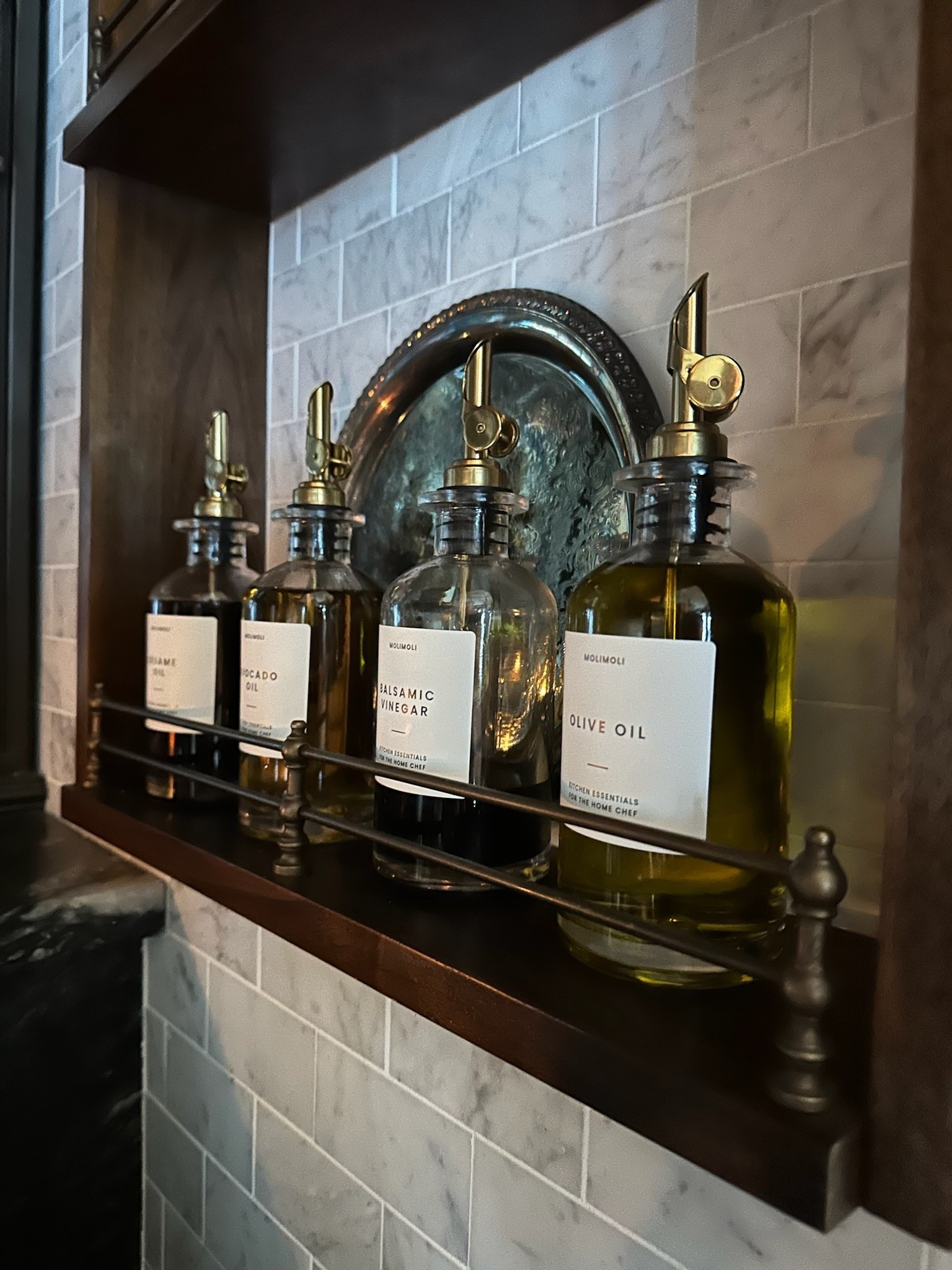 A charming little oil or dressing jar with a graceful spout that turns everyday cooking into something a bit more whimsical and romantic. 

 #KitchenDetails #EverydayElevated #WhimsicalHome #TimelessKitchen #CookingInspo #HomeDecor #DesignDetails #callsigndesign