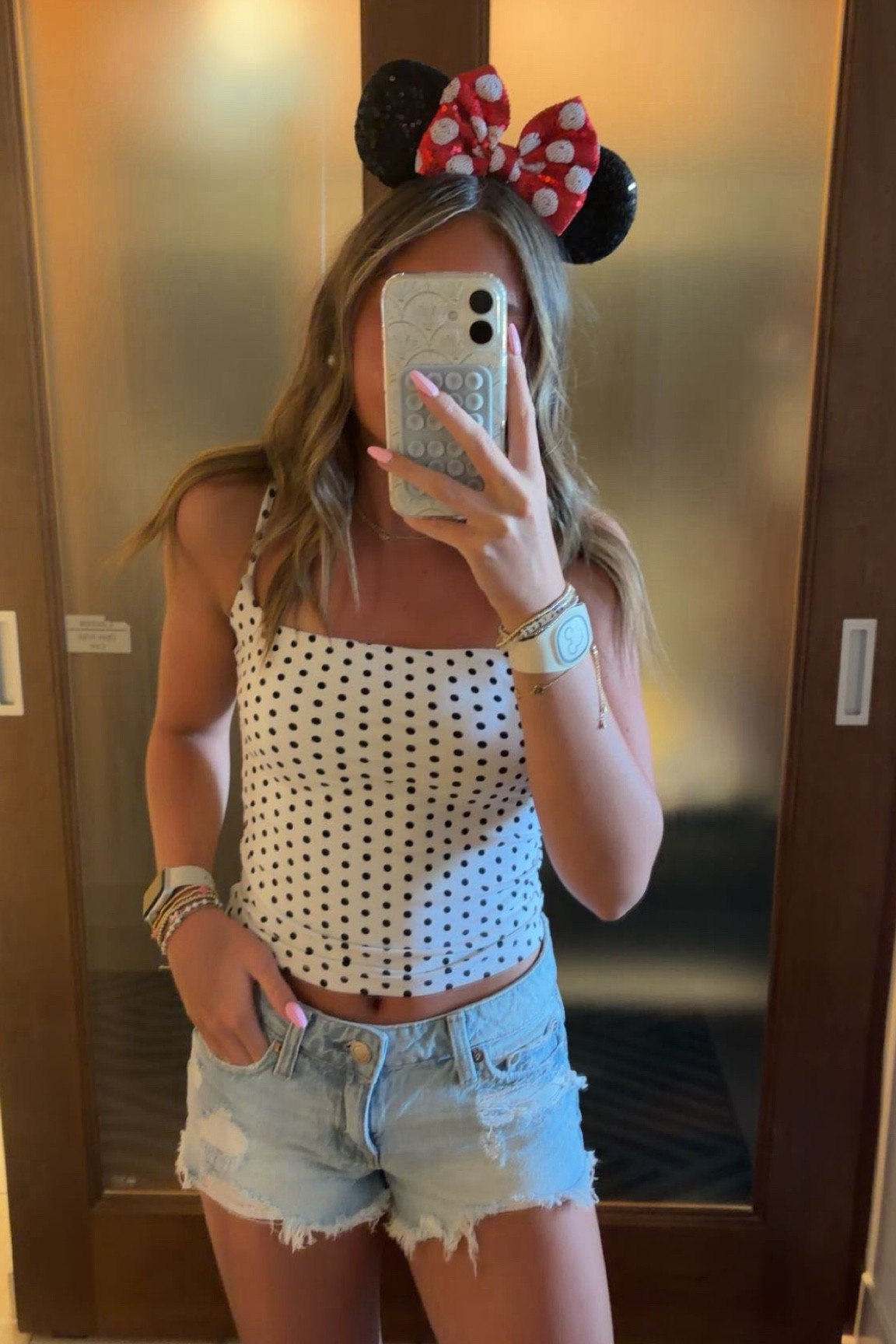 what i wore in magic kingdom!! can’t ever go wrong with a tank and shorts, so here are my favs! this polka dot amazon tank is the cutest, and i have many pieces from the brand. my low rise jean shorts are from aero and fit true to size! and these simple disney ears are a classic, they pull it all together!! wearing with a pair of nikes, i filled all the rings on my watch this day!!

#ootd #disneyoutfit #ltkamazon #magickingdomootd #disneyootd

#LTKActive #LTKdayinmylife #LTKootd