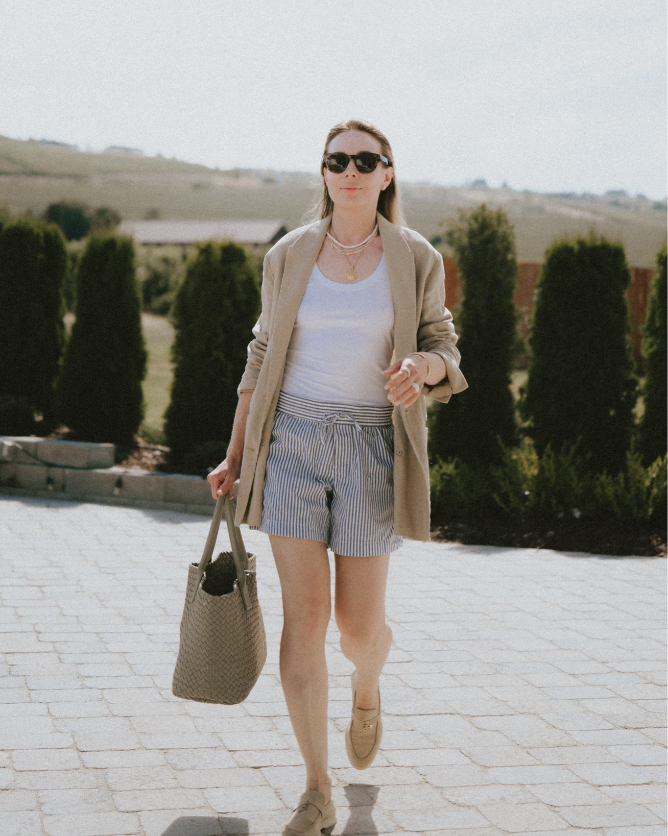 More details on the OOTD that you all loved so much: older Everlane linen blazer + @OAK + FORT tank top + Gap boxer shorts + Lori Piana summer walk charms white sole lobar shoes + Bottega Veneta medium can at intrecciato tote. Necklace @Etsy

#LTKootd #LTKmomlife #LTKSeasonal