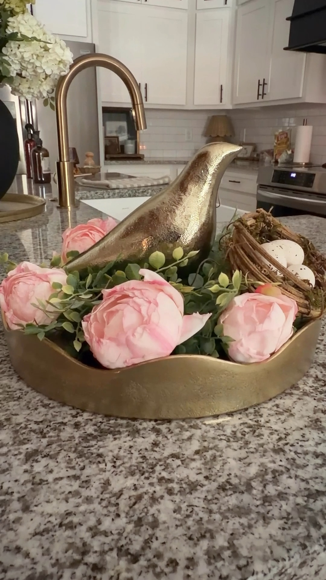 I started off by using this gorgeous scalloped bowl. Added in a candle ring and then my bird. I decided to pop some heads off some florals and just place them around the wreath. And of course, every bird needs a nest. 🪺 
