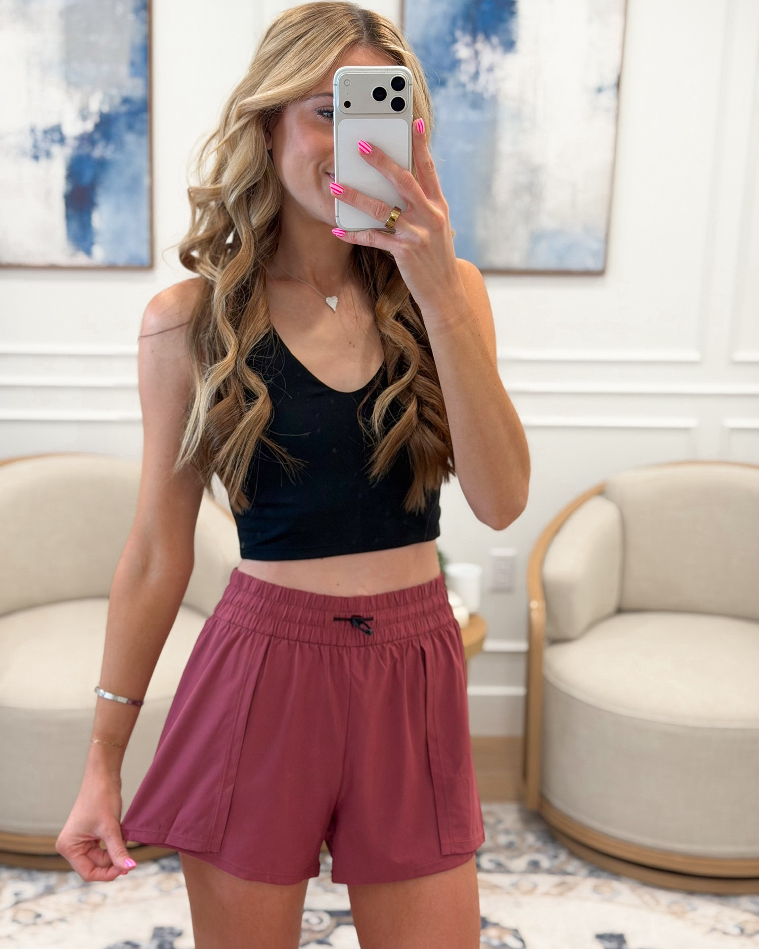 Black v-neck sports bra and mauve smocked waist athletic shorts from Amazon — this color combo is so unexpectedly good and both pieces are so affordable 🖤🌸✨ The pleated shorts with the drawstring detail are so flattering and the mauve color is such a fresh take on activewear this season. Both are separate pieces and I am wearing a small, I am 5’8” for reference. 

#LTKfitnessgoals #LTKActive #LTKSeasonal