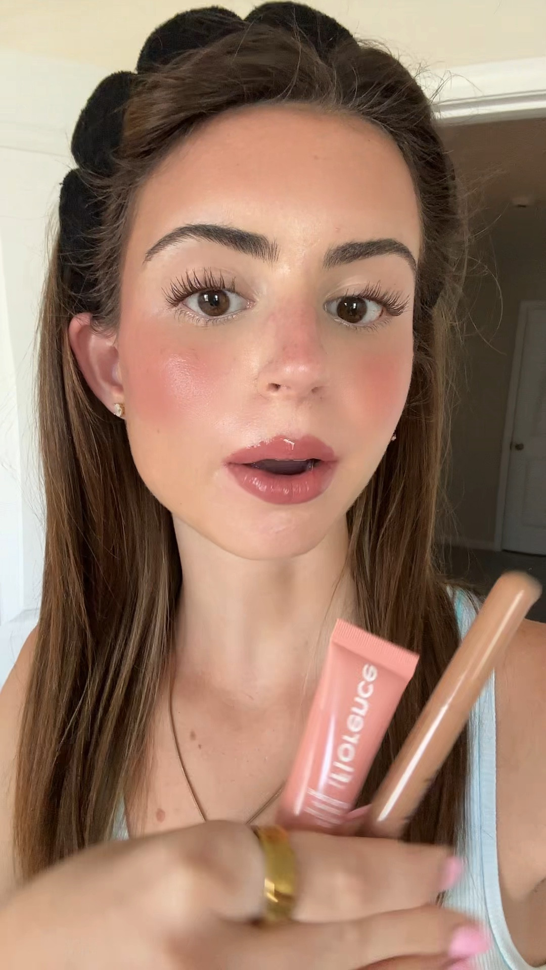 Florence lip balm in shade “toasted sugar” + rhode lip liner in shade “lift”