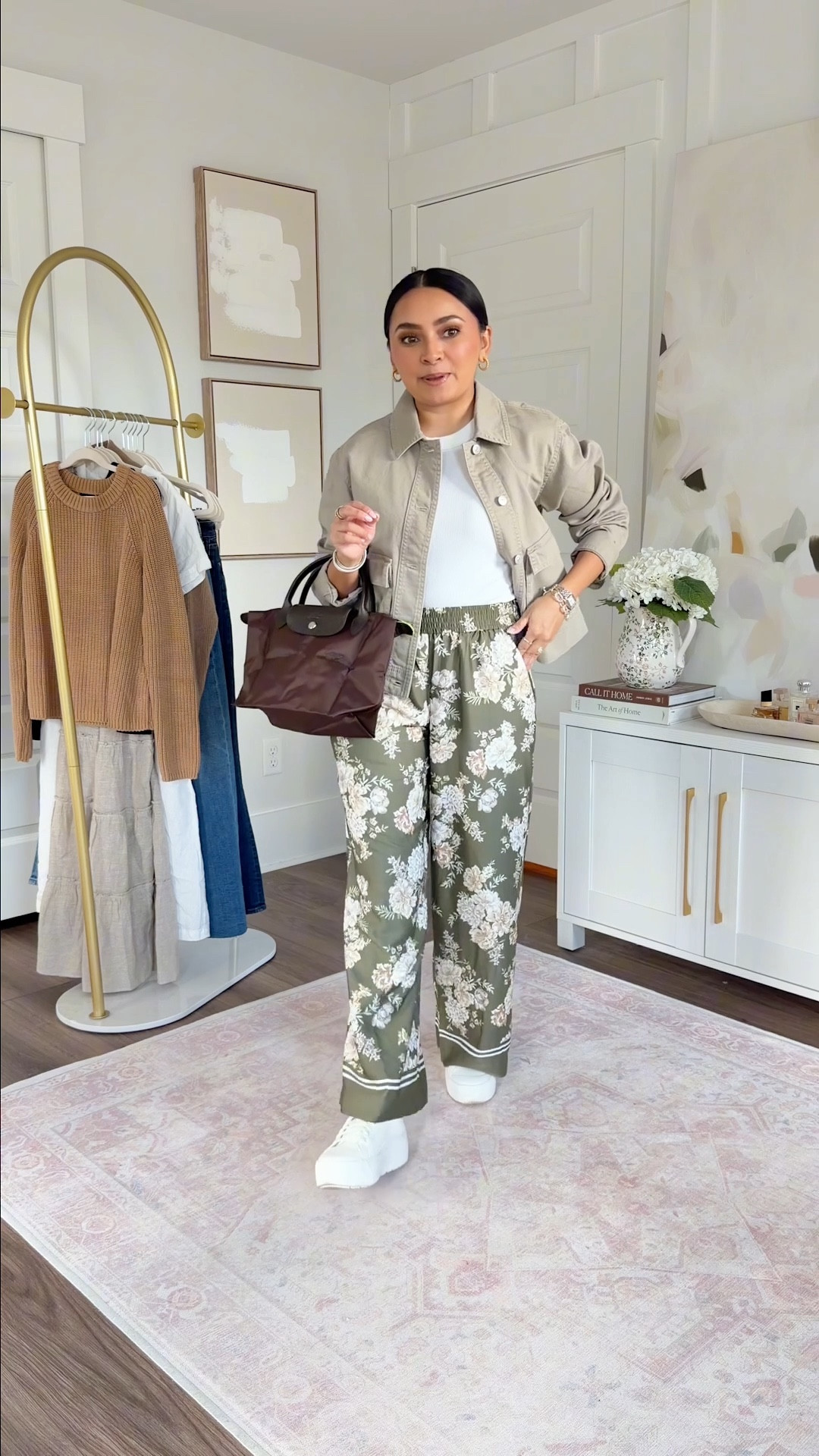 Outfits with sneakers for Travel
For reference: I’m 5’0, petite, 32b bra size, and 2/26 in bottoms, pear shaped. 
*Everything I share is unaltered! TTS means true to size. Between size 5-6.5 in shoes

Olive green jacket size xs petite TTS White tanks size xs petite TTS Floral pants size xs petite TTS 

Europe outfits Paris style London looks Spring outfits 2026 Spring dresses Business casual workwear #LTKSpringSale 

 #LTKgrwm #LTKPetite