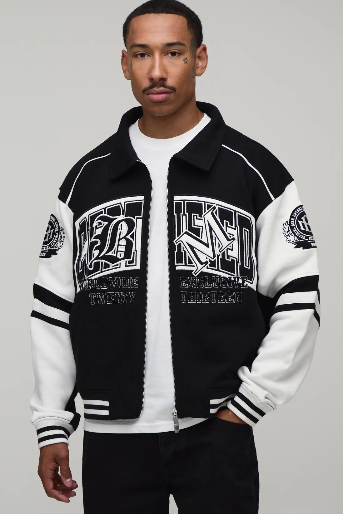 Black Regular Fit Collared Certified Varsity Jersey Jacket | BOOHOOMAN | boohooMAN (DE, IE & UK)