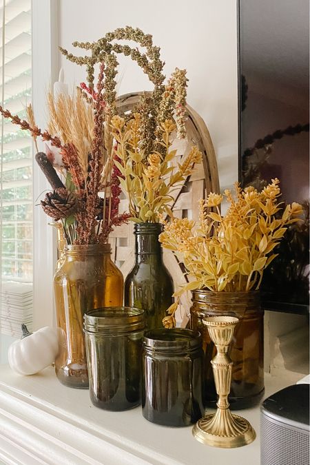 More Fall Decor on my mantle! I tinted these bottles and jars myself but I have linked some similar finds if you wanted to replicate this decor. 

#LTKSeasonal #LTKhome #LTKunder50
