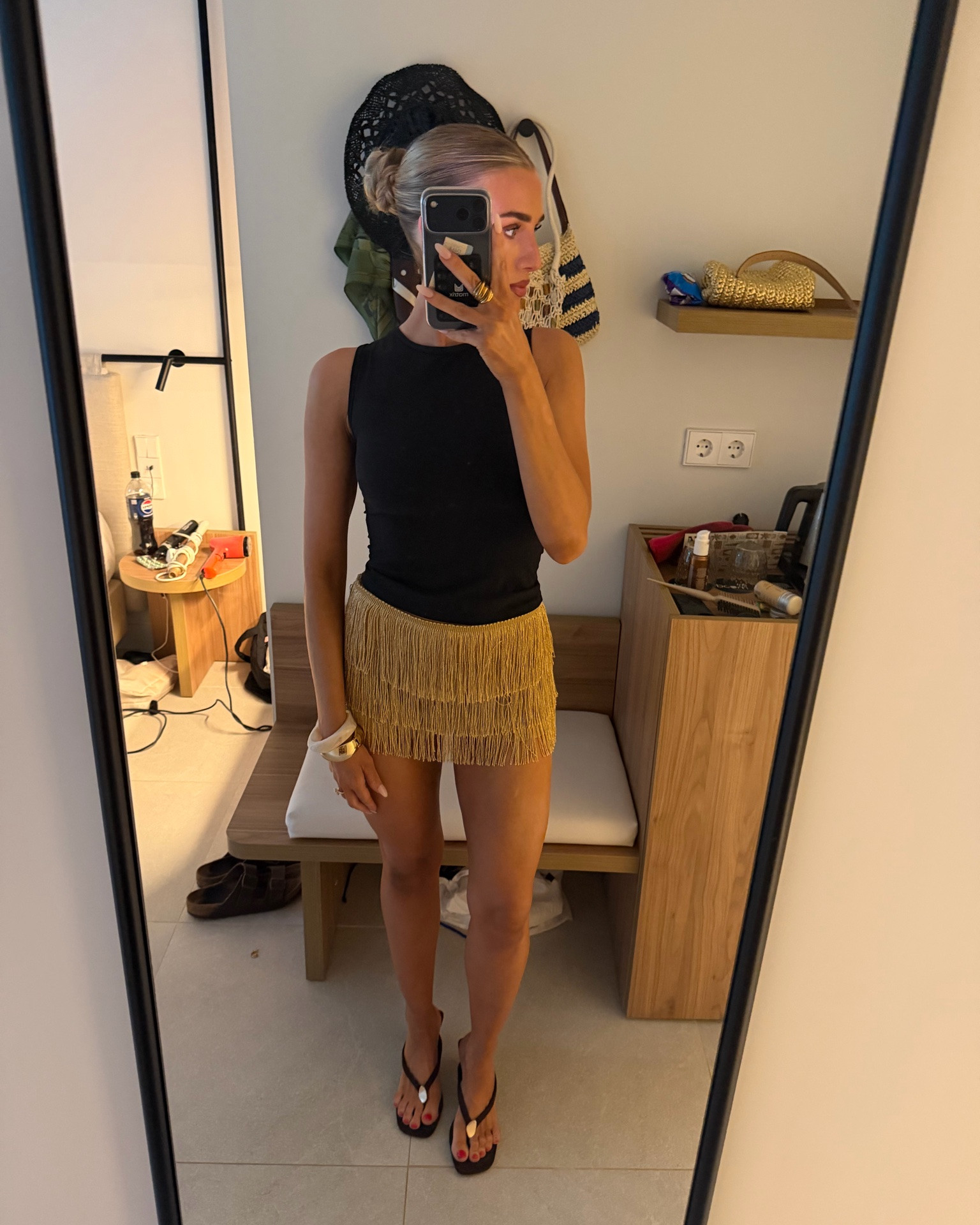 Gold shorts/skirt - such a good price! Also the perfect black vest top too! Skims material!

#LTKuk #LTKsummer #LTKtravel