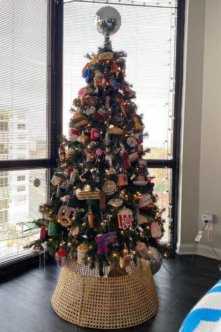 A look at my food themed Christmas tree 🥑🧀🥨🍔🍟🌭🍣 I love the disco ball trend so this disco ball tree topper was a must. I collect food ornaments and always try to take advantage of sales on Christmas ornaments when I can. // food tree, themed Christmas tree, silver tinsel

#LTKhome #LTKHoliday #LTKfindsunder50