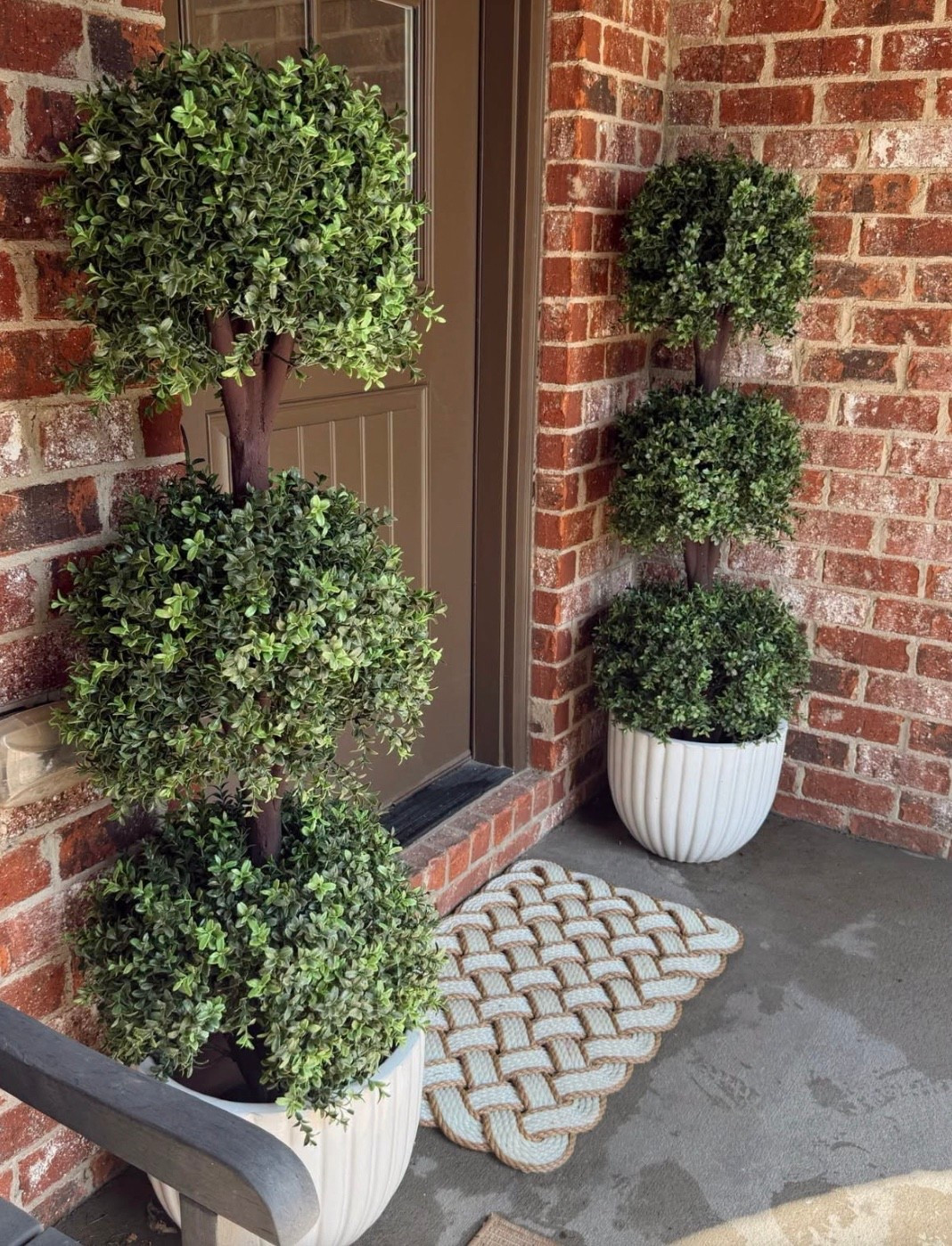 These faux topiaries on our front porch 
🤎
🍃￼
I love how much prettier and elevated they make the porch feel! Such an easy way to add some greenery and give the front of our home a finished look.

#LTKOver40 #LTKHome #LTKSeasonal
