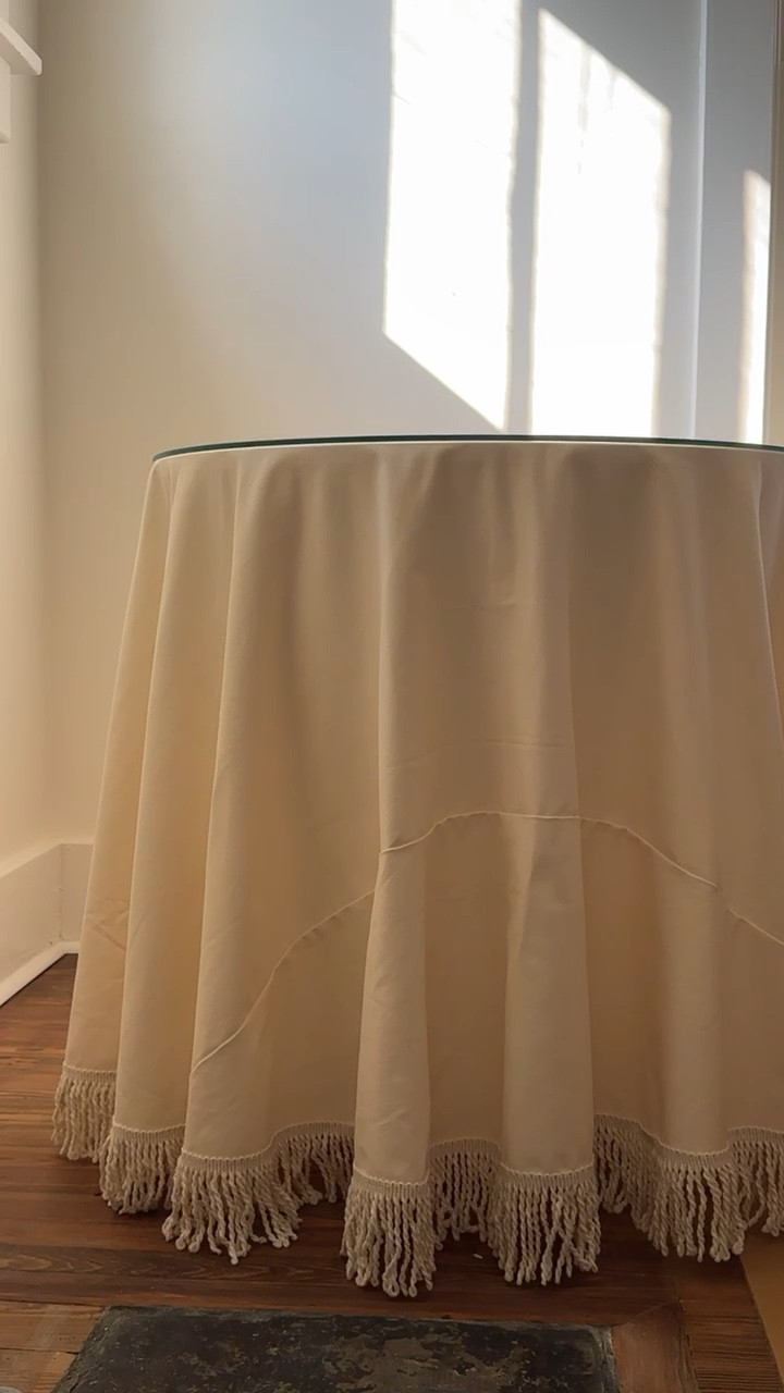 I just purchased two of these skirted side tables for our living room and they feel so elegant! Especially love the fringe trim. Included is the table base (in your preferred size) and your choice of tablecloth. We went with the color: fringed off white twill.

#LTKHome #LTKstorytime #LTKmomlife