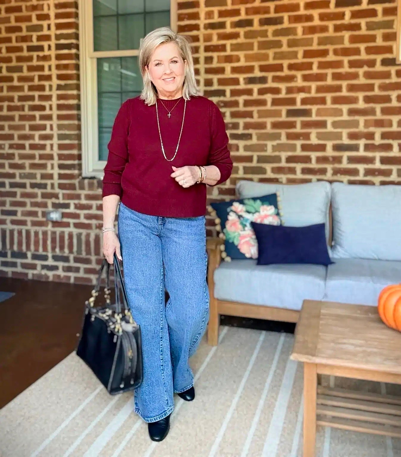 Burgundy is trending for Fall and this sweater is a great option! I have it paired with wide leg jeans and some black loafers for a casual, but put together look. My sweater is a medium and jeans are a size 8.