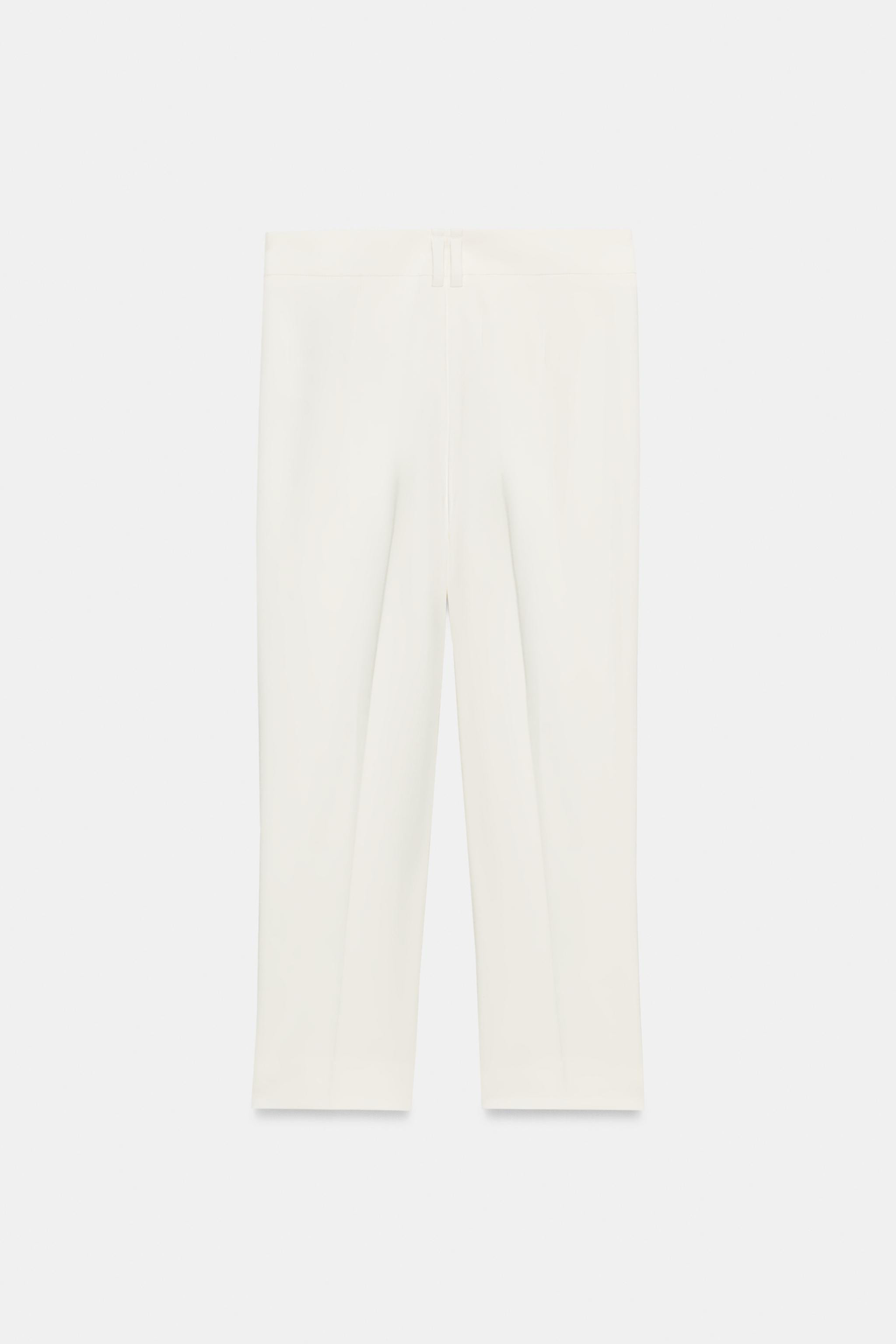 Model height: 173 cmLow-rise trousers. Cropped below the knee with side vents at the hem. Featuri... | Zara UK