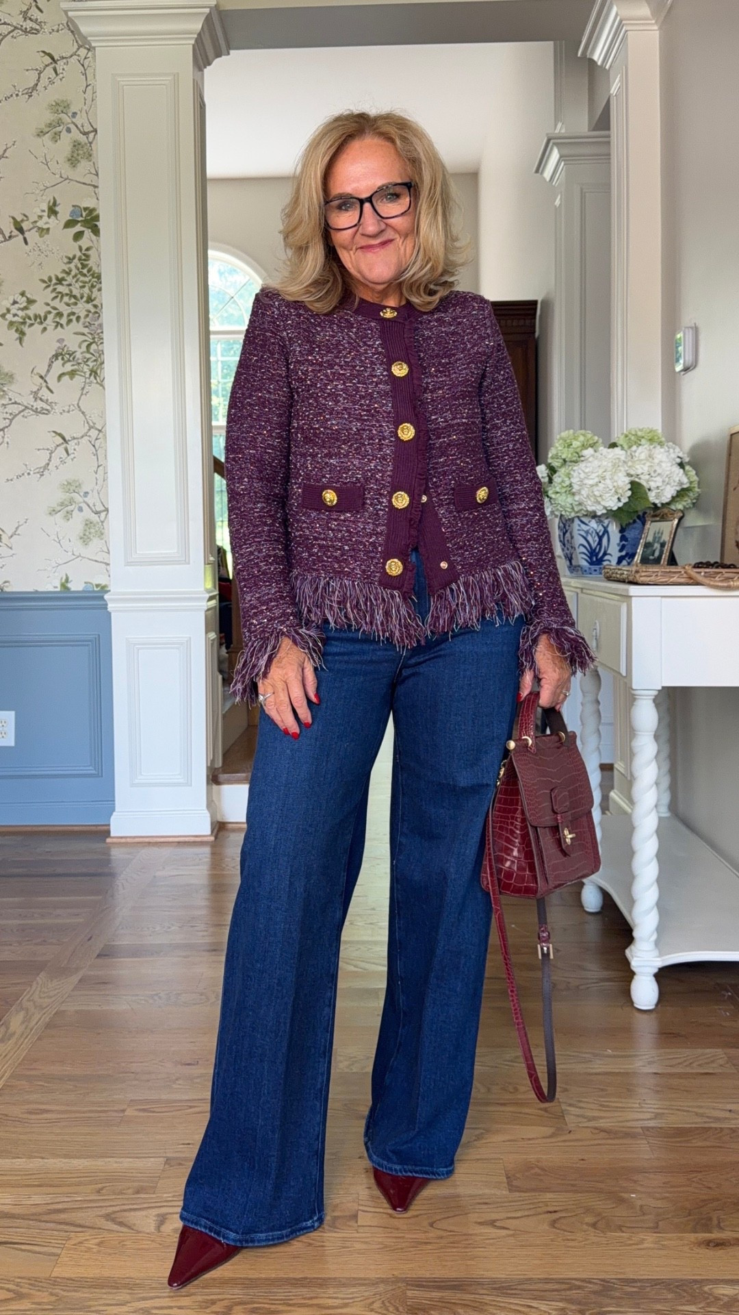 Now this jacket has personality! The fringe, gold buttons, and rich color make a simple pair of jeans feel so much more interesting.