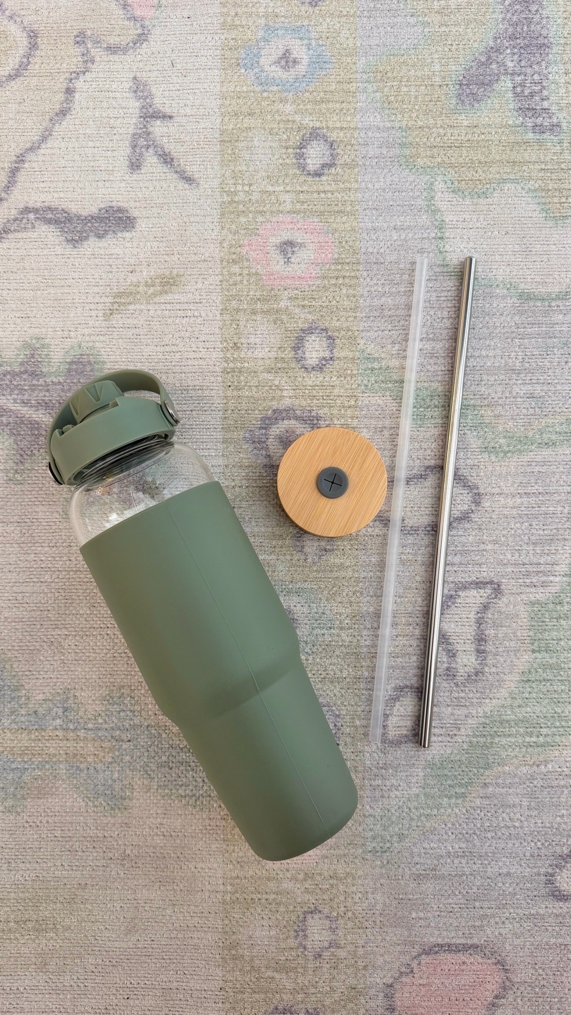 Trying out this new glass tumbler water bottle- BPA free and comes with a stainless steel straw and bamboo lid!

#LTKHome #LTKActive #LTKKids