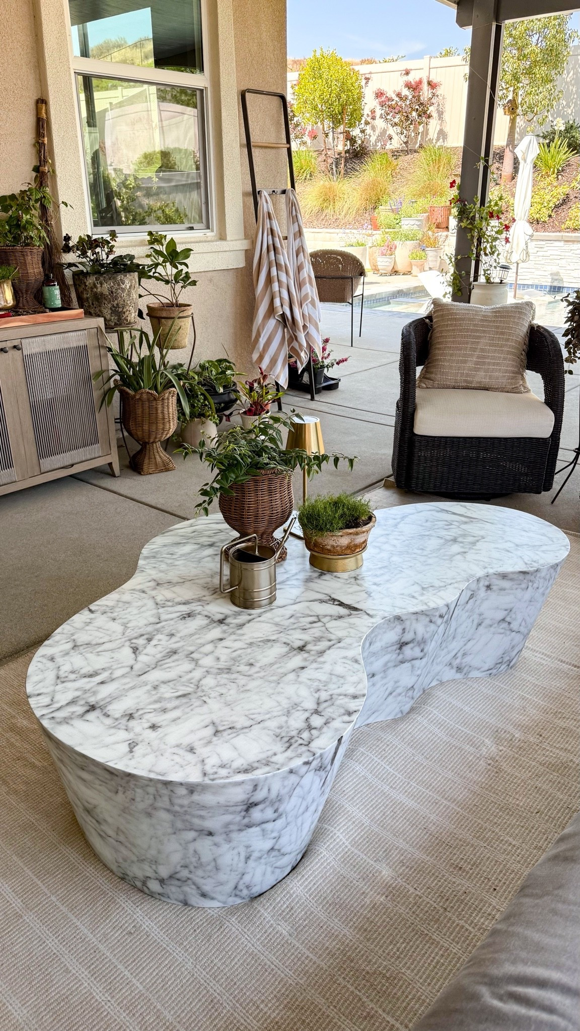 I’m obsessed with my patio ever since I gave it a little refresh. This marble table is the star of the show—it makes the whole space feel so cozy, elevated, and perfect for slow summer mornings outside

#LTKSeasonal #LTKHome