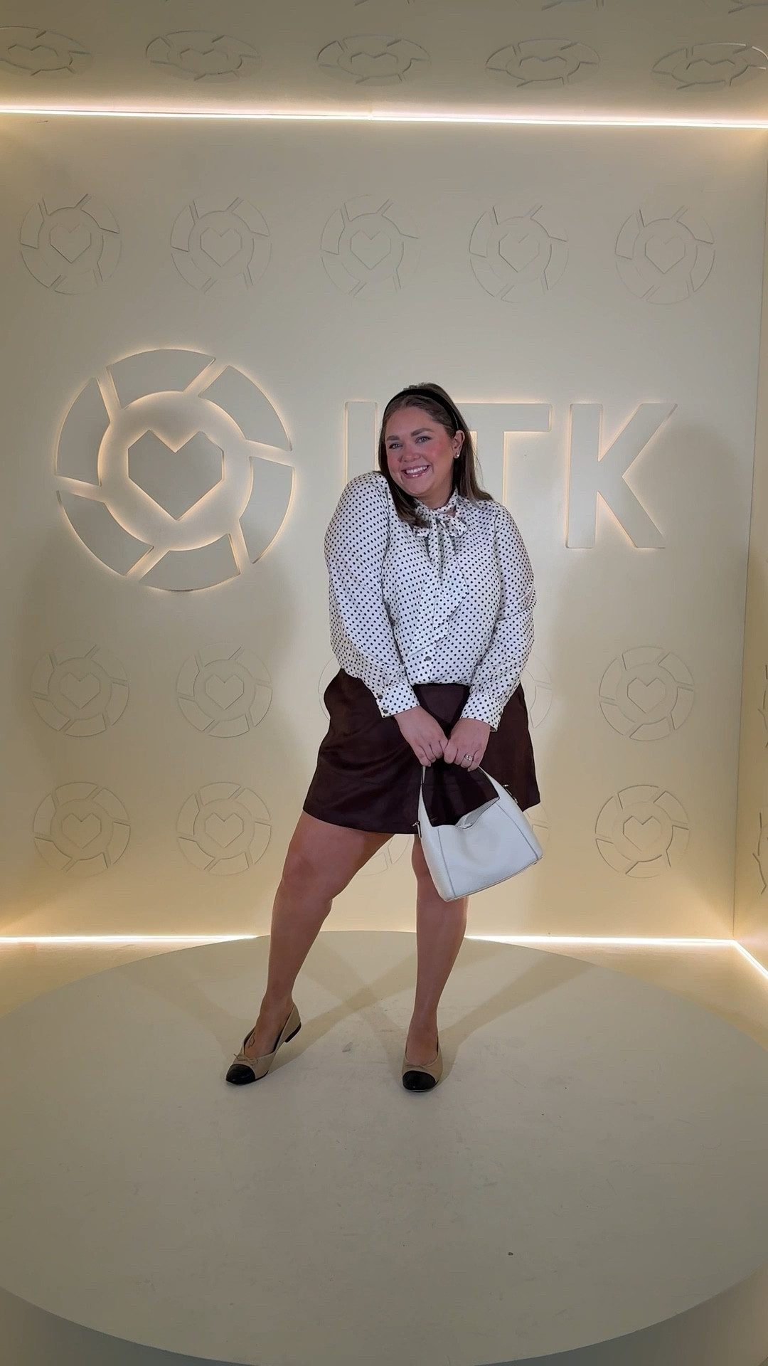 Business casual plus size outfit idea wearing 18/20 in tie blouse and suede skort  

#LTKPlusSize #LTKCon