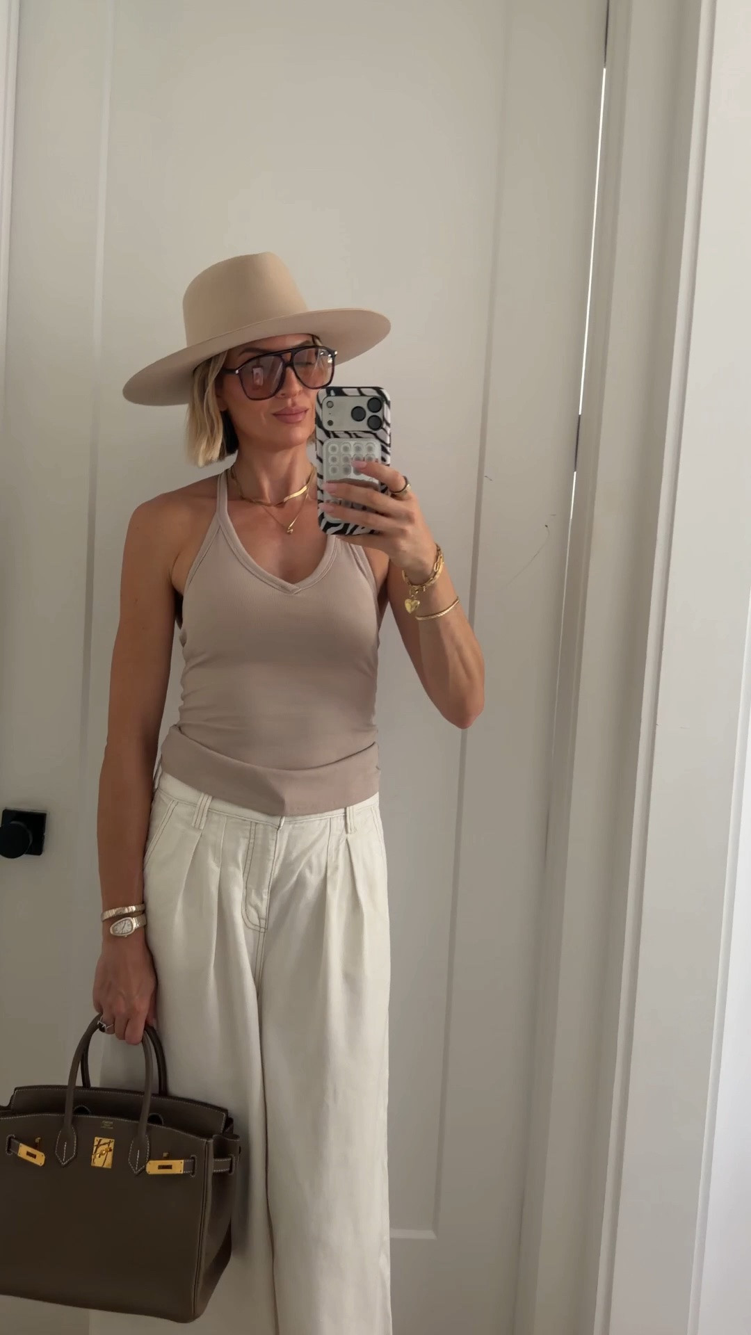 Wearing a small in the tank. It has a built-in bra. I also own it in white. Pants run big. Size down. Shoes run small. Order half size up ￼￼

@Pistola Denim @gigipip

#LTKdayinmylife #LTKOver40 #LTKTall