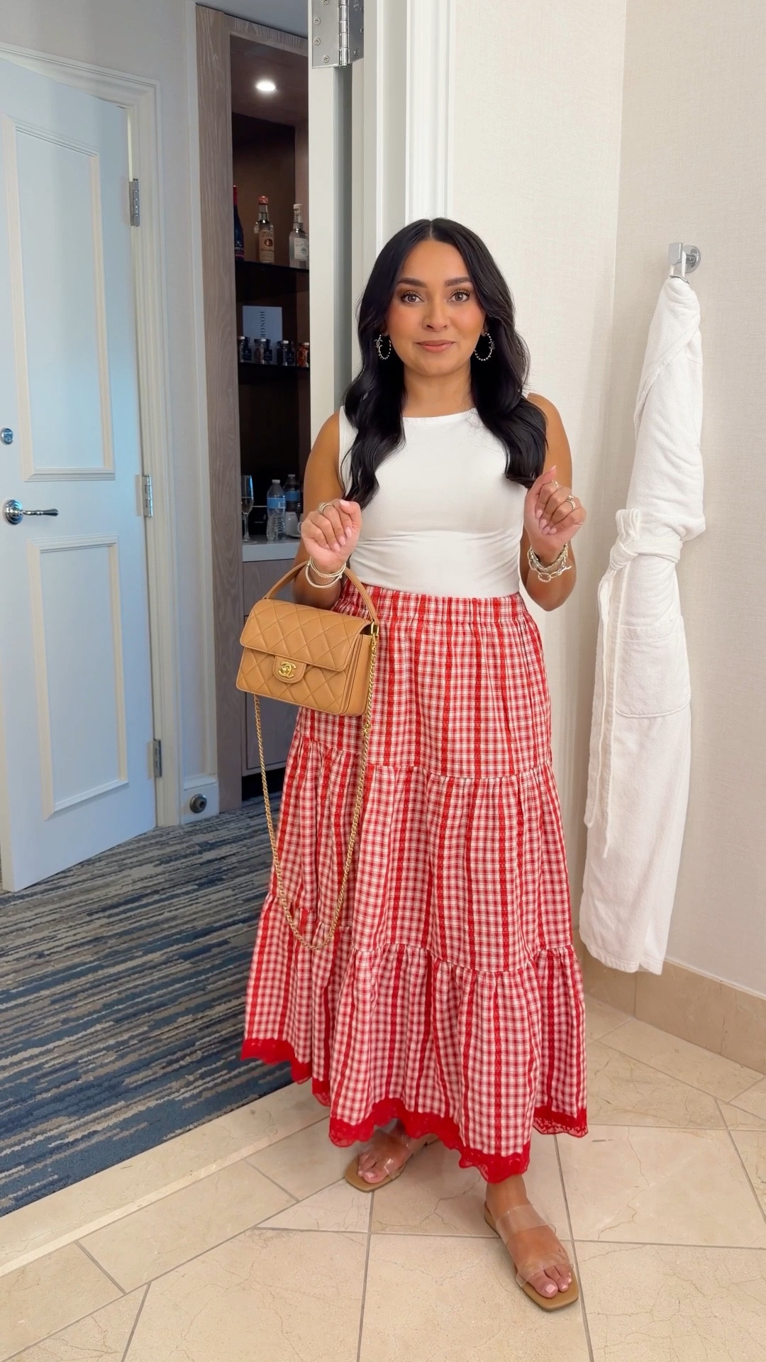 Dinner outfit in Dallas!
Tank is old - linked similar. 
Red gingham skirt size small TTS 
Clear sandals size 5.5 TTS
Bag and earrings are older from Chanel 

#LTKTravel #LTKootd #LTKPetite