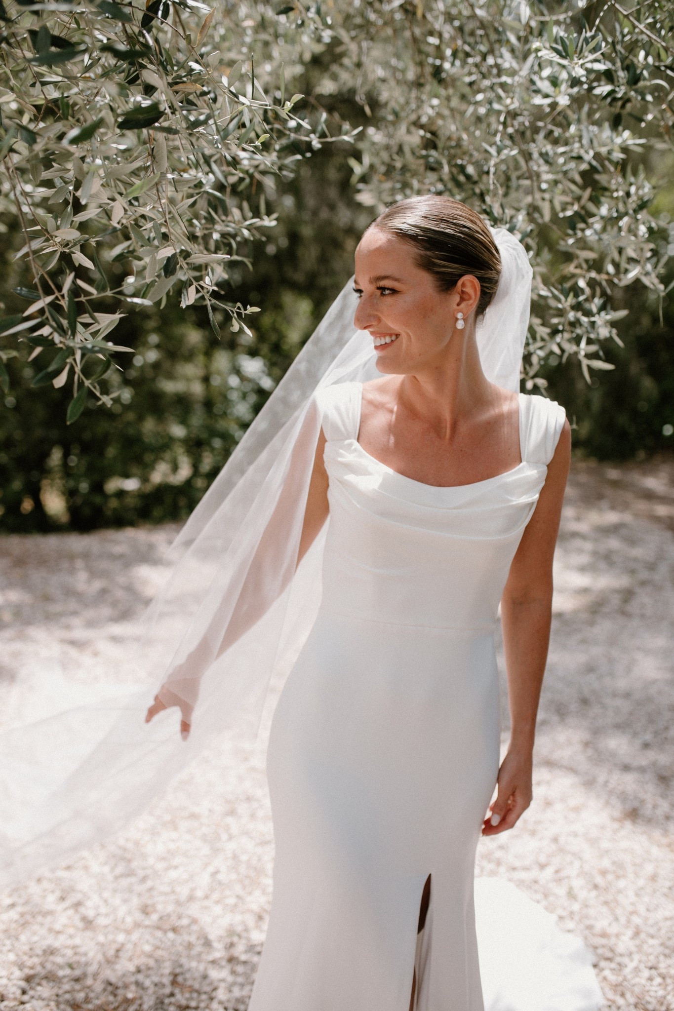 A closer look at the front of my wedding dress and veil details.

Dress was custom altered and recreated to have the straps and back silhouette I’d always envisioned. 

The cathedral veil was kept minimal for simple and timeless elegance.


#LTKBride 

#LTKTravel #LTKWedding #LTKBeauty
