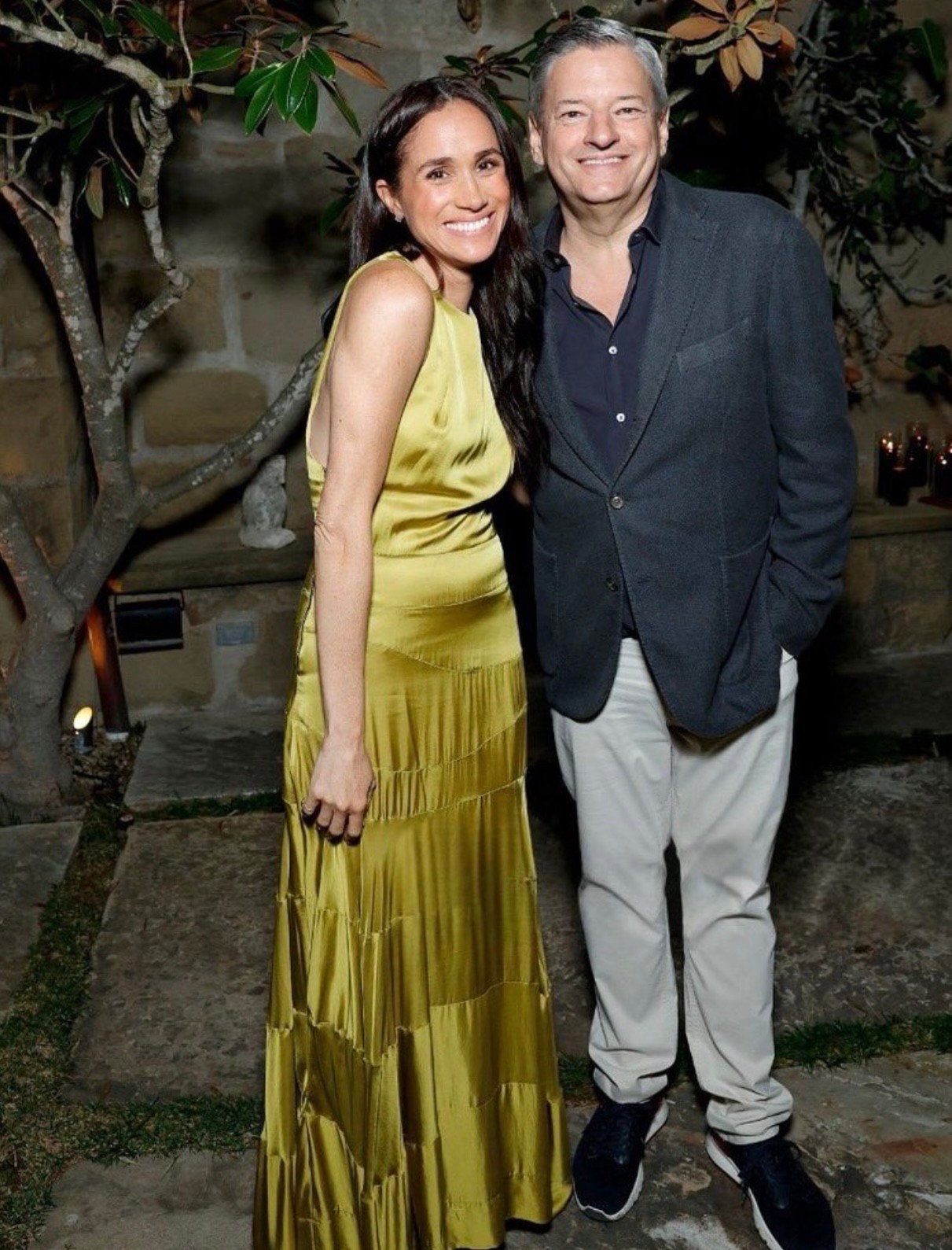 Meghan Markle's dress is a timeless silhouette reimagined in fluid viscose. The gown features a flowing tiered skirt, a fitted bodice, and a graceful back design with a covered button and loop closure for a refined finish. A side zip and subtle waist detail create a flattering, sculptural shape that moves beautifully with the body.