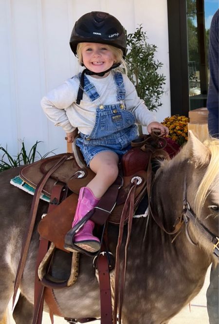 Cutest cowgirl   Linking toddler light up pink boots and saddle for her pony 

#LTKstyletip #LTKkids #LTKfamily