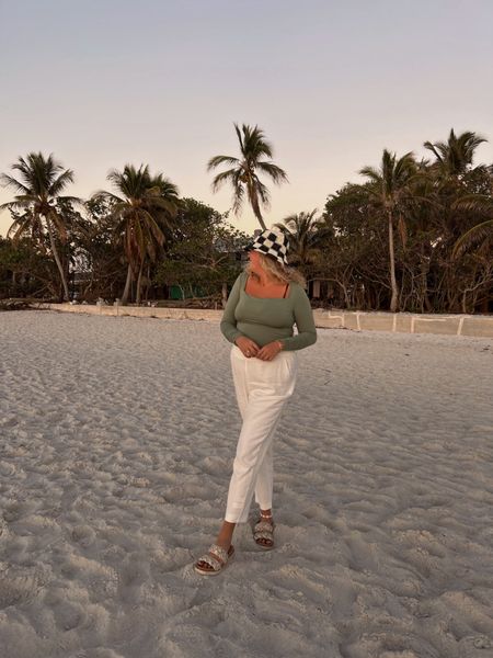 Lilly Pulitzer white linen summer pants and green cinched long sleeve with black and white vintage checkered bucket hat for a spring break look. Can’t wait to be in Florida watching sunsets on the beach again soon ☀️

#LTKstyletip #LTKcurves #LTKSeasonal