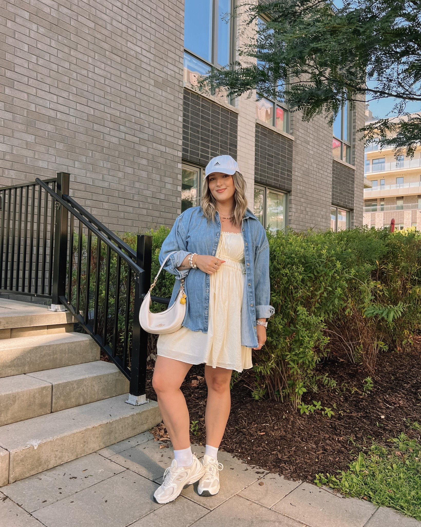 Casual summer outfit! Wearing my usual size L in both the butter yellow dress and denim shirt. New Balance sneakers are so comfy but run a little big, I’m usually a 9.5-10 and wear a 9.

#LTKsale #LTKsummer #LTKmidsize