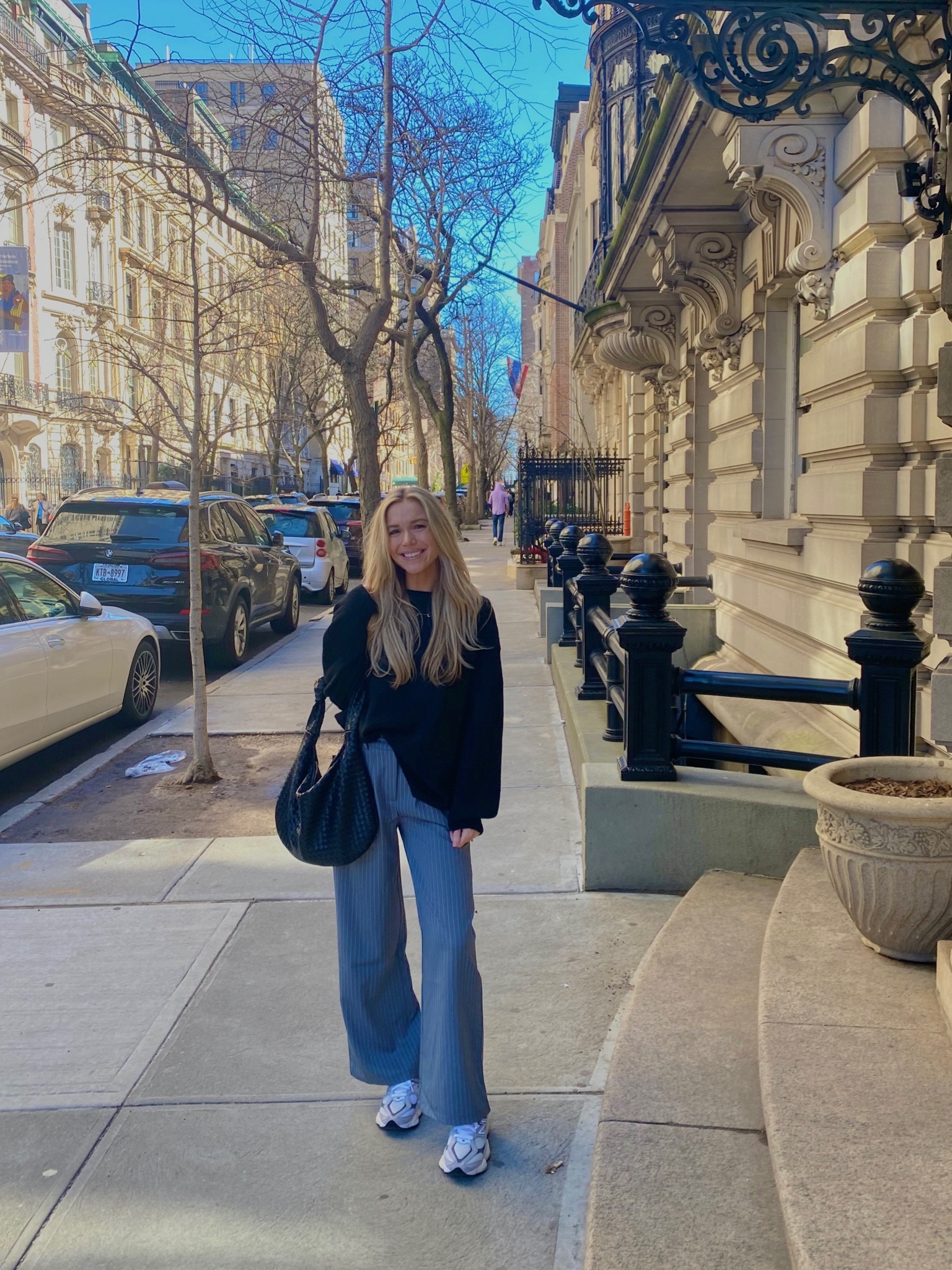 the perfect pinstripe tailored pants !! stretchy oversized sweater // new balance 9060s // nyc outfit inspo // princess polly 

#LTKstyletip #LTKtravel #LTKfindsunder100