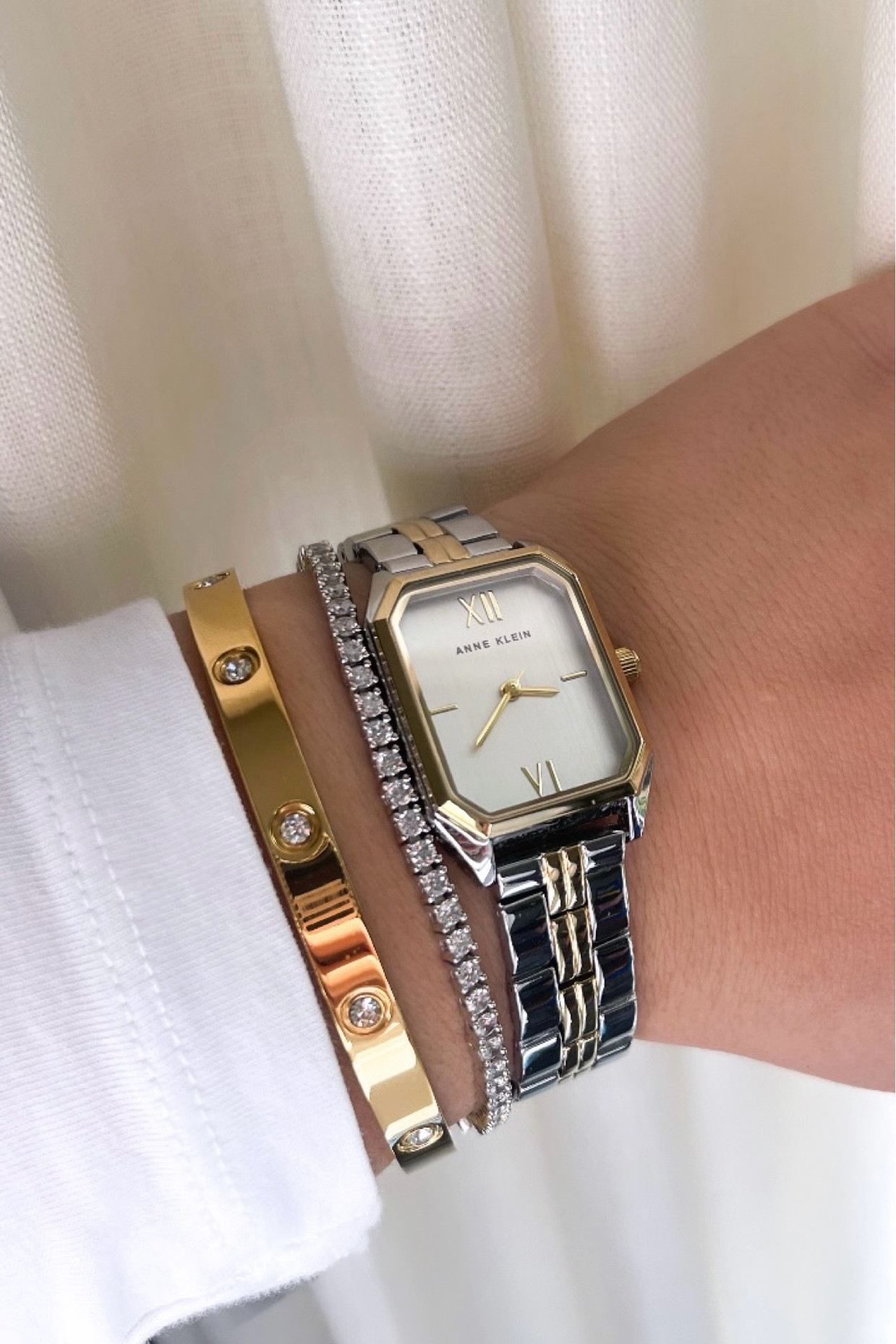 Stunning, inexpensive watch in two tone color. On sale! 

#LTKStyleTip #LTKFindsUnder100 #LTKFindsUnder50