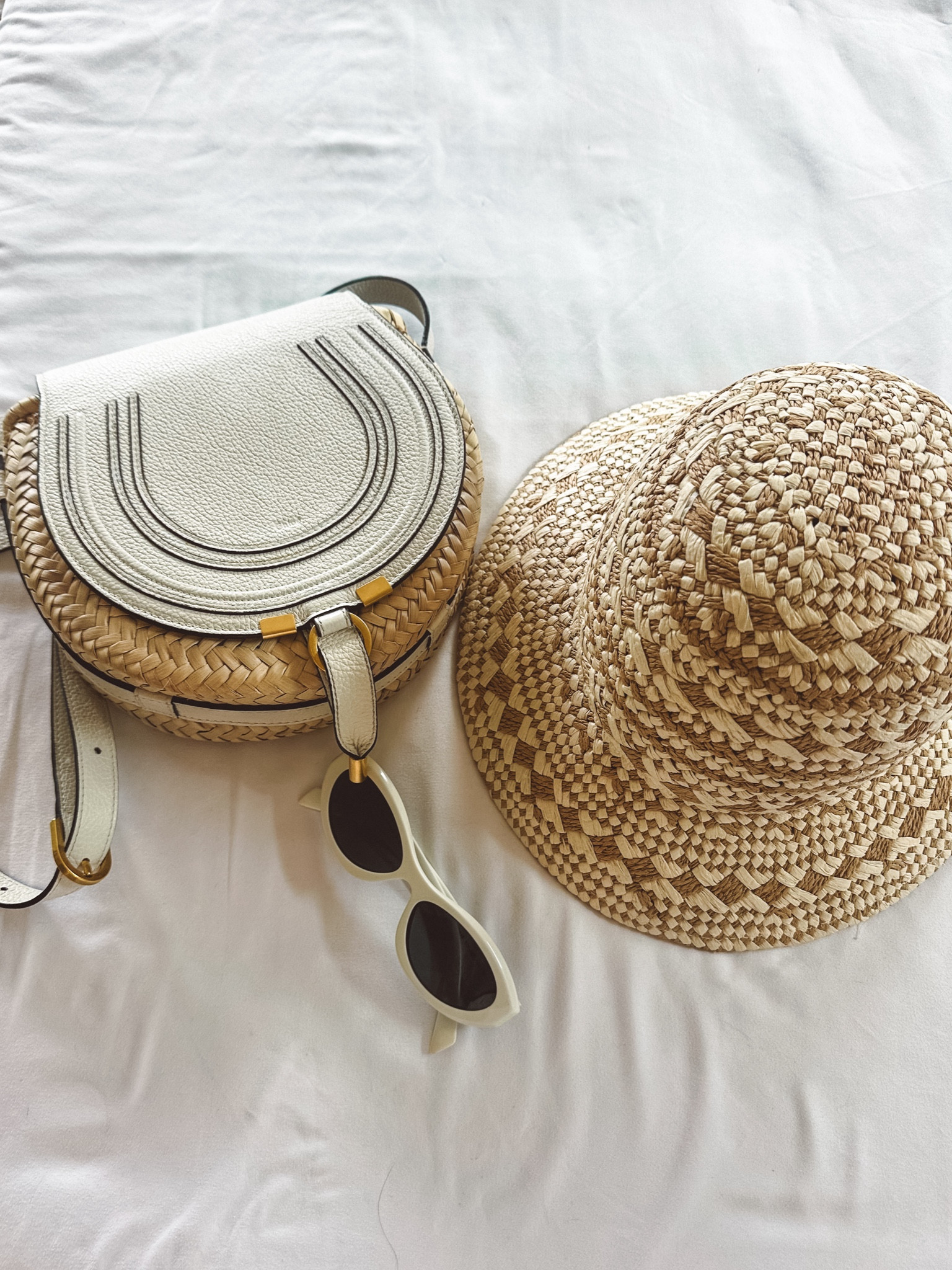 Summer accessories for the win ☀️
Unfortunately I couldn’t find the Prada glasses in white to tag, but I added the same style in black.
The Chloe Marie Crossbody bag in raffia was also impossible to find, so I tagged a good alternative for ya 🫶

#LTKFestival #LTKitbag #LTKtravel