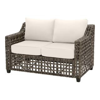 Hampton Bay Briar Ridge Brown Wicker Outdoor Patio Loveseat with CushionGuard Almond Tan Cushions... | The Home Depot