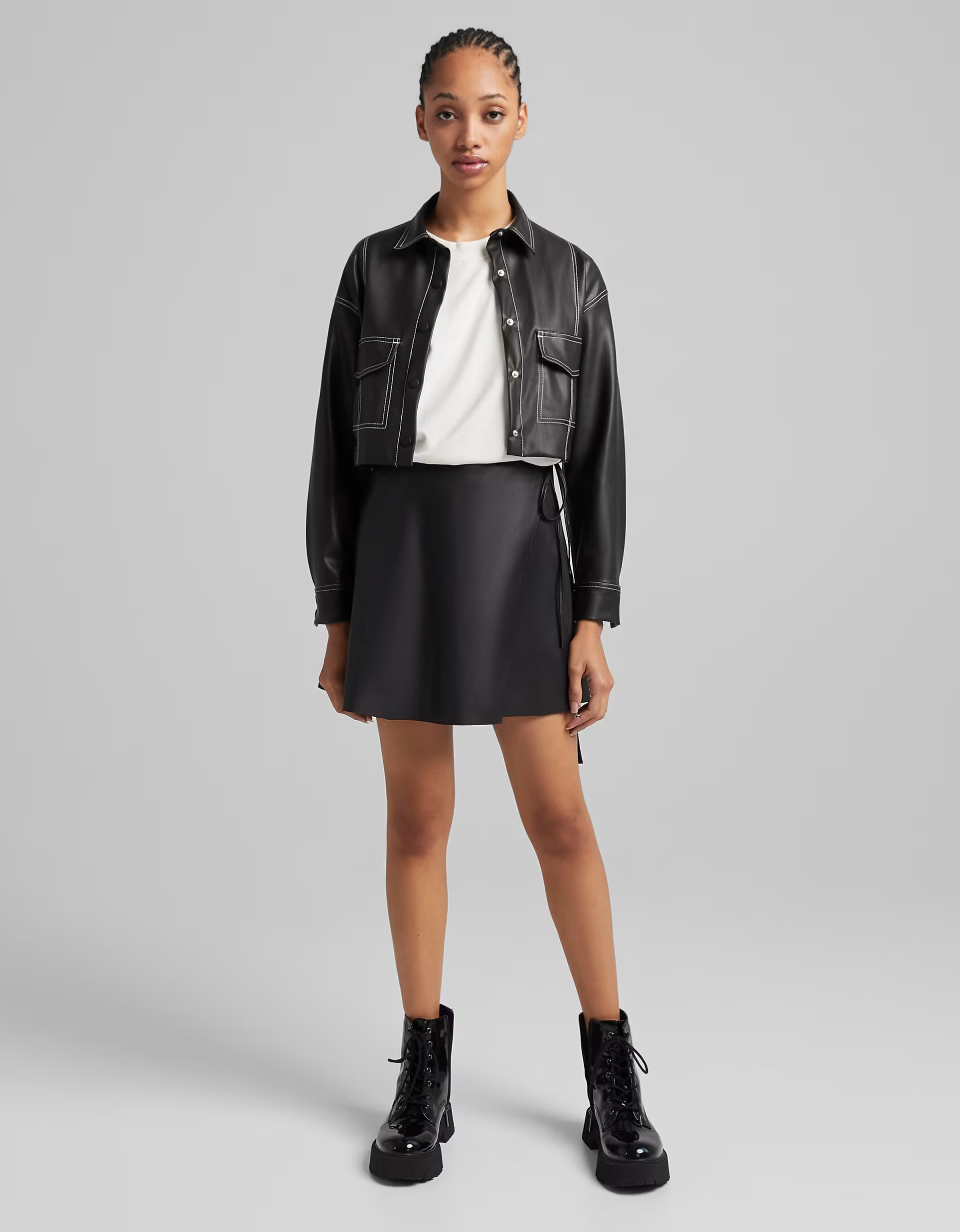 Bershka faux leather skater skirt with wrap around detail in black | ASOS (Global)
