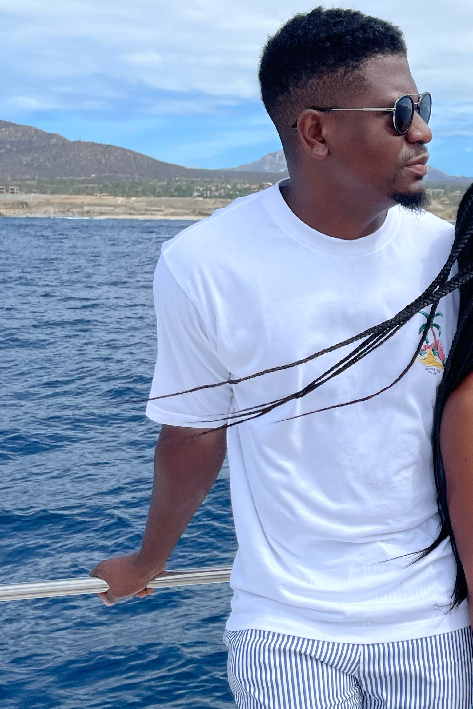 Scotch and soda graphic tee, blue and white stripped swimming trunks and ray ban sunglasses 

#LTKtravel #LTKmens #LTKstyletip