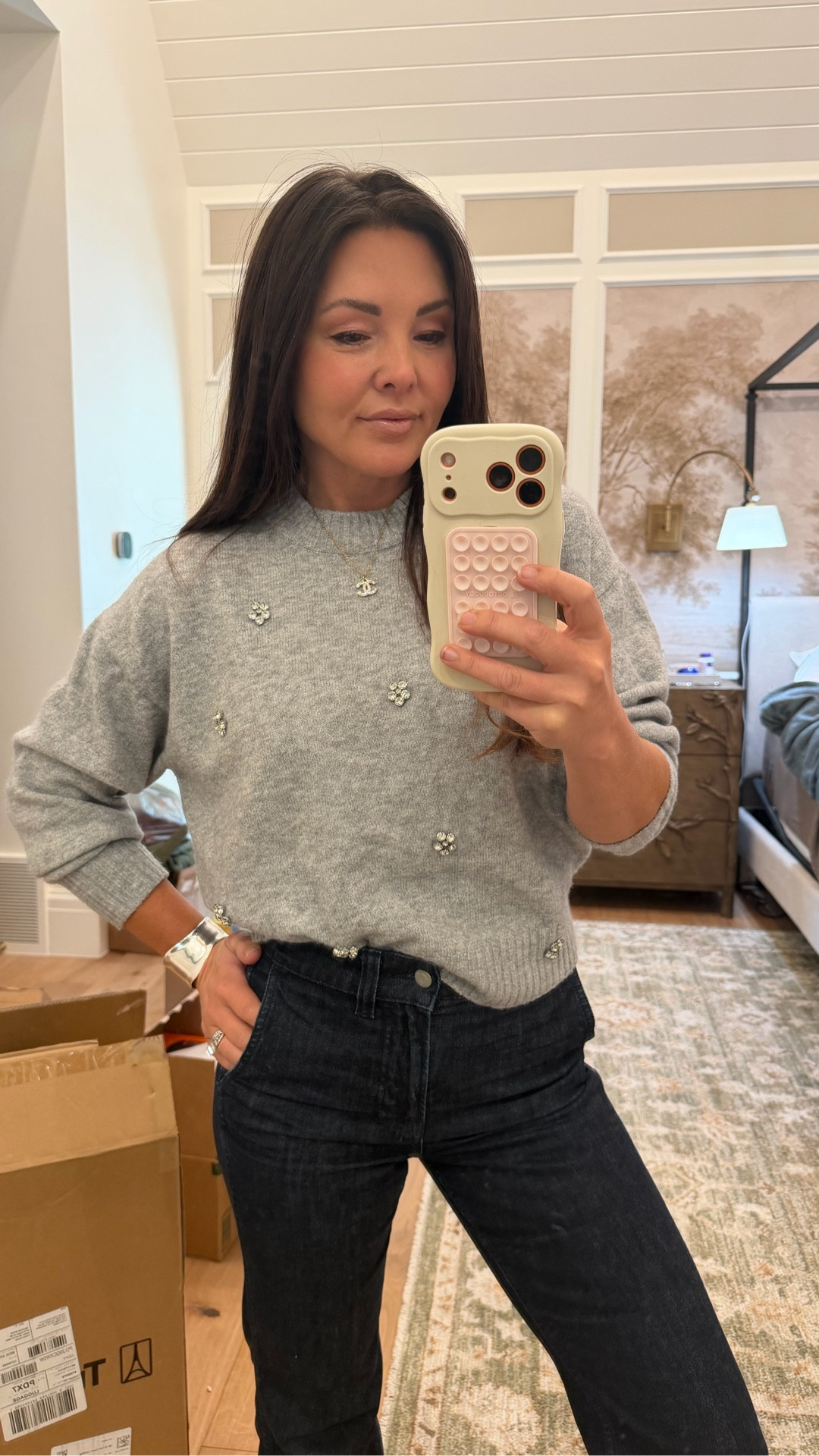Rhinestone gray sweater with out trouser jeans and white sneakers. 

#LTKHoliday #LTKSaleAlert #LTKFindsUnder50