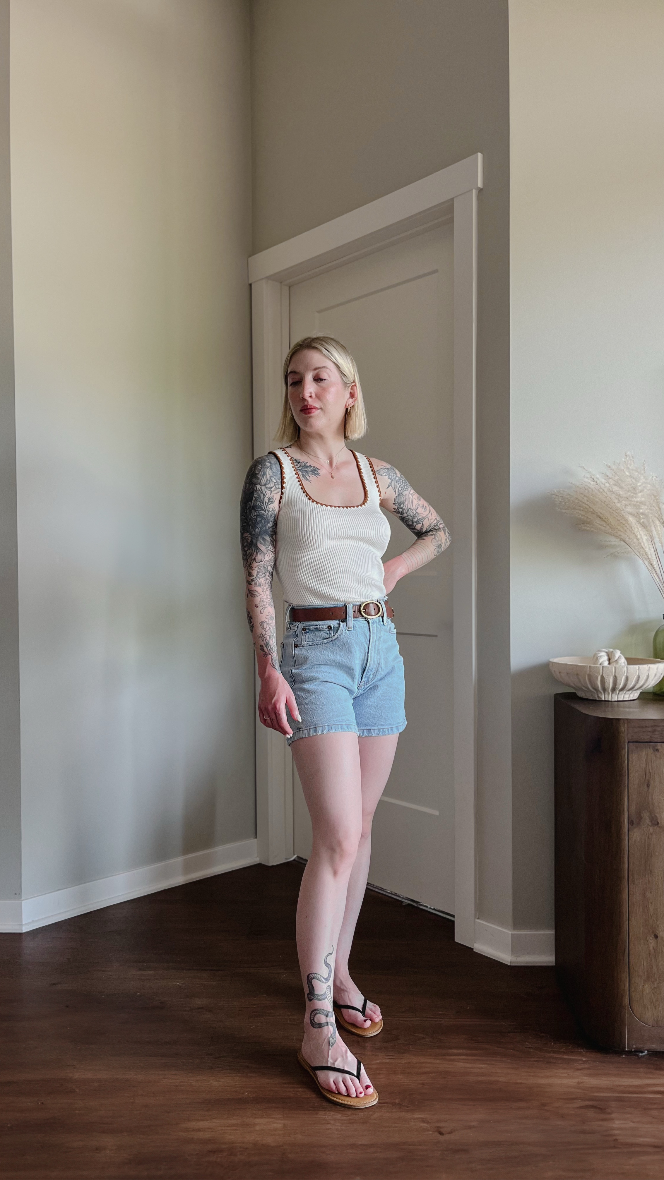 Today’s outfit was built with shorts, a tank, and a pair of flip flops, just like when I was a kid! But these pieces are all so much more elevated, thankfully 😂 so I still felt chic. Thoughtful details like the crocheted neckline of the tank, the oval belt buckle, and the two-tone leather flip flops all come together to make this look work. Also, isn’t the bag so pretty?? It instantly elevates anything I wear it with!

#LTKStyleTip #LTKFindsUnder100 #LTKSeasonal