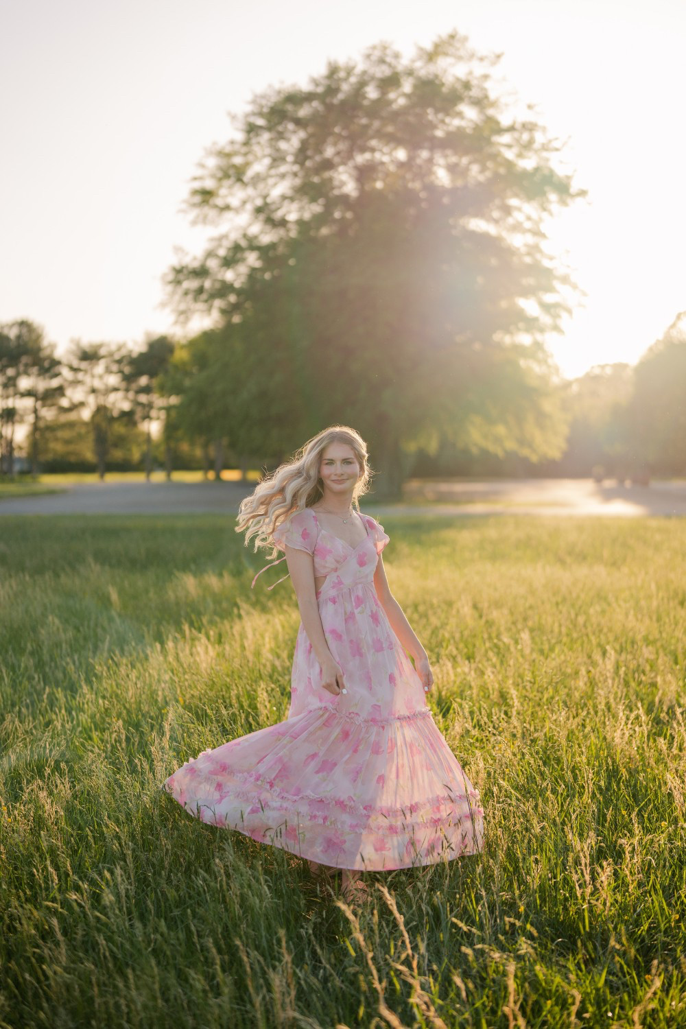 Floaty, floral, and made for twirling ✨💗
This pink maxi dress photographed like a dream during golden hour. It’s romantic, comfy, and perfect for spring or summer senior sessions.
I linked similar photo-ready styles over on LTK — this vibe never misses! 

 