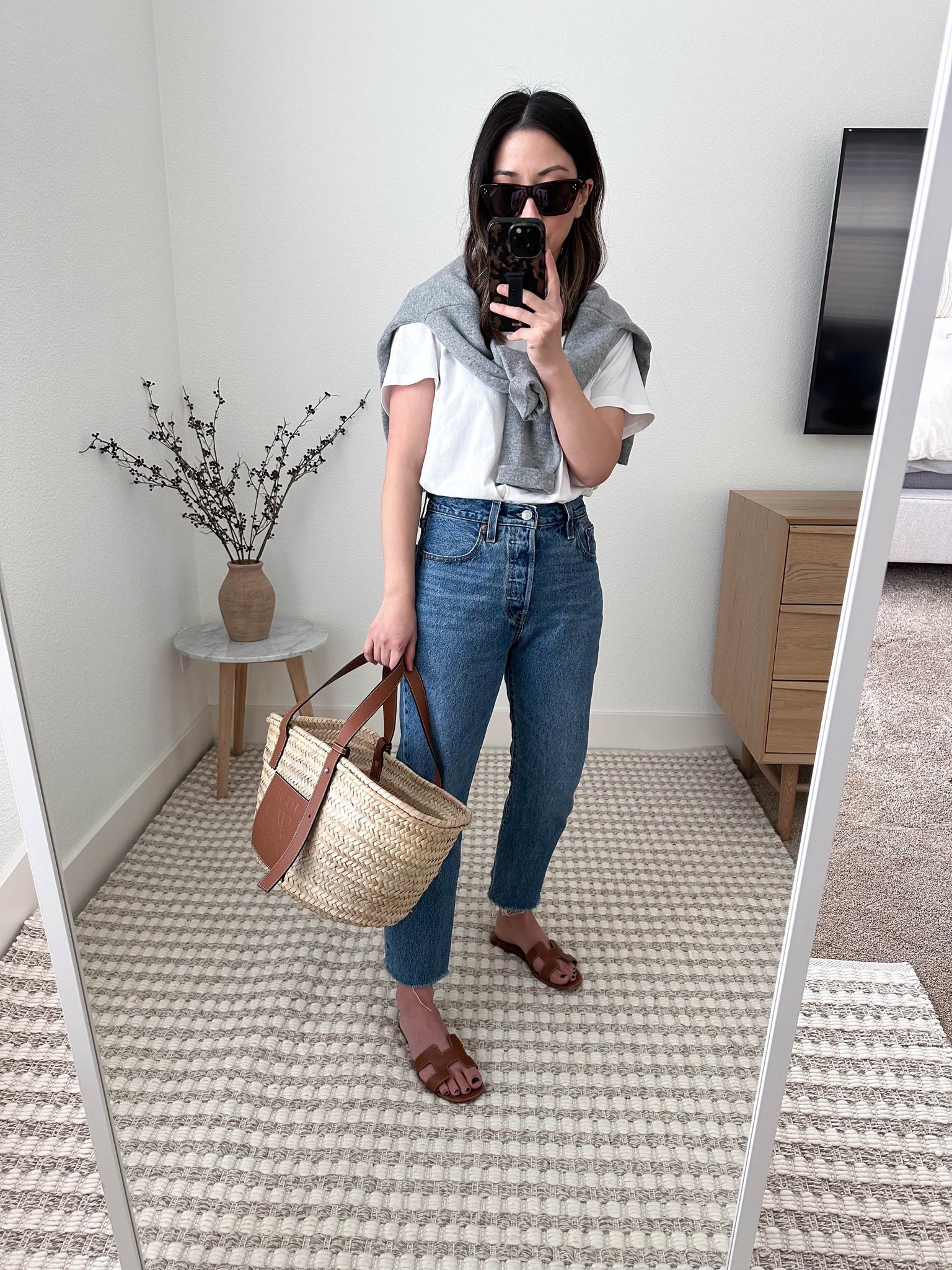 Levi’s 501 crop jeans- included in Shopbop sale! Run TTS. Inseam is 25.25.” perfect medium blue wash. 

Sweater- Eileen Fisher xs (old)
Tee- Everlane medium 
Jeans- Levi’s 24
Sandals- Hermes 
Bag- Loewe medium 
Sunglasses- Celine

Levi’s jeans, jeans, sandals, petite style, neutral outfit, spring style. 

#LTKFind #LTKstyletip #LTKsalealert