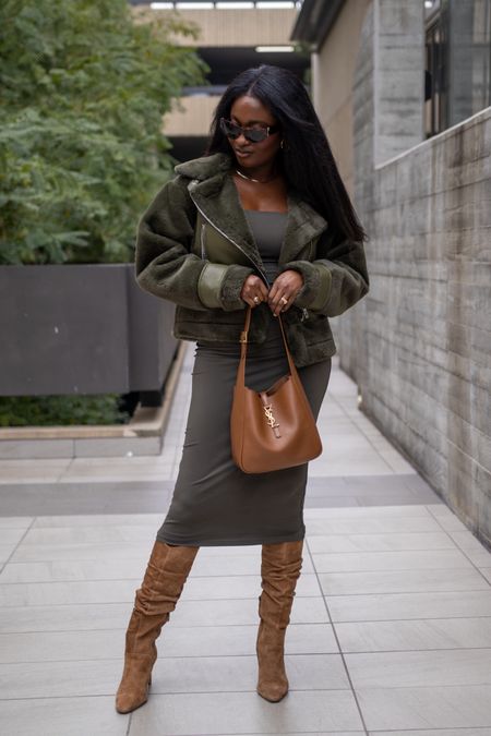 Winter outfit inspo | ysl hobo bag, tan boots, fur jacket, green dress 

#LTKstyletip #LTKitbag #LTKshoecrush