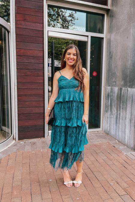 Wedding Guest Dress 💚 Such a beautiful Tiered Dress for a wedding, travel, or any special occasion. The straps are adjustable. Wearing size Small. The brand Lulus does run a size small so size up one size. 



#LTKwedding #LTKfindsunder100 #LTKSeasonal